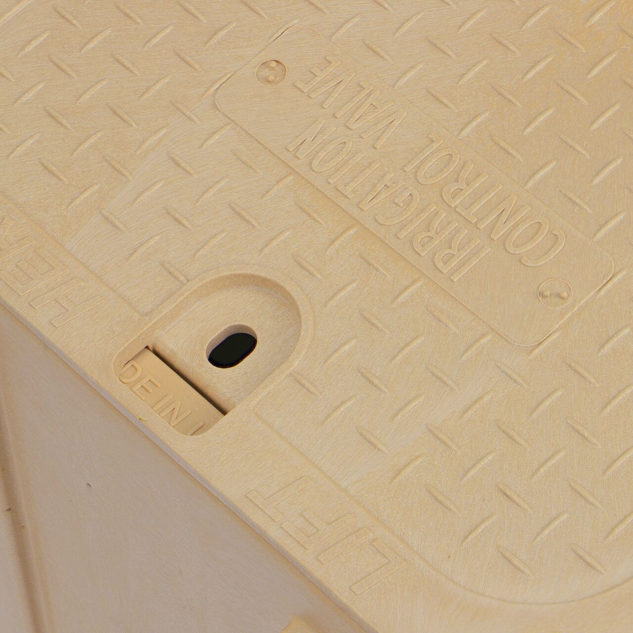 The valve box lid securely in place on the NDS 14 in. x 19 in. Rectangular Pro-Spec® Series Sand Box and Sand Irrigation Control Valve Cover (NDS 314BCSAND) keeping components protected against the elements, foot traffic, lawn care equipment, and potential vandalism while keeping them out of sight