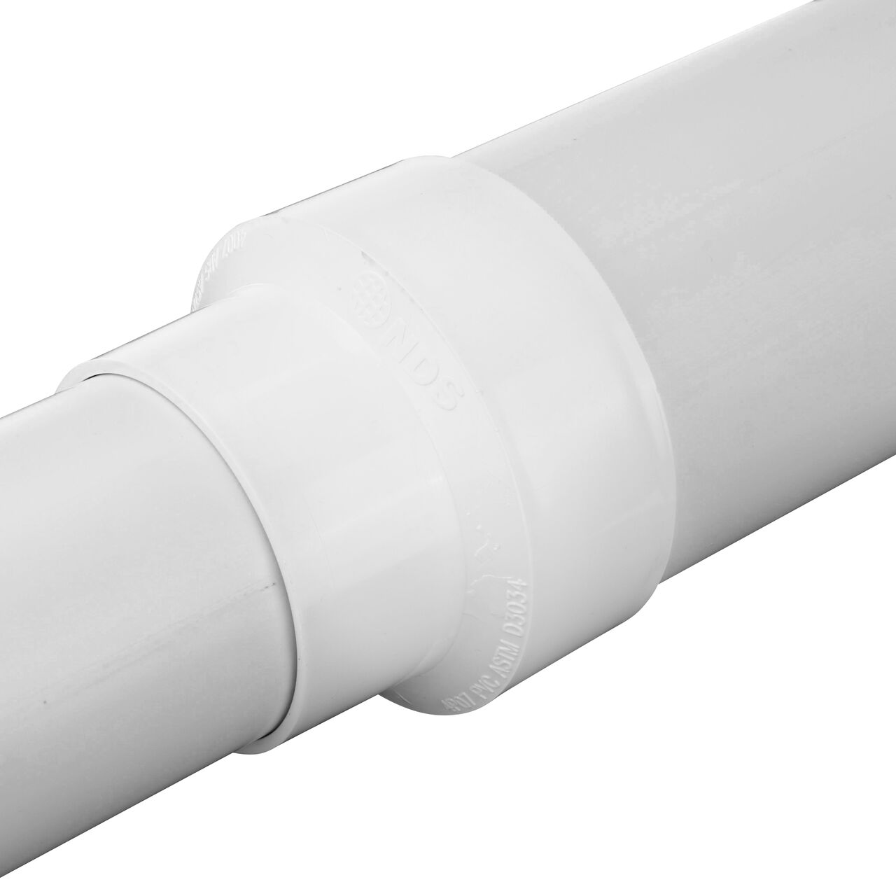 The NDS PVC Sewer and Drain Reducer Coupling (NDS 4P07*, NDS 4P07, NDS 407*) with 3 in. and 4 in. S&D Pipe attached to each corrosponding end