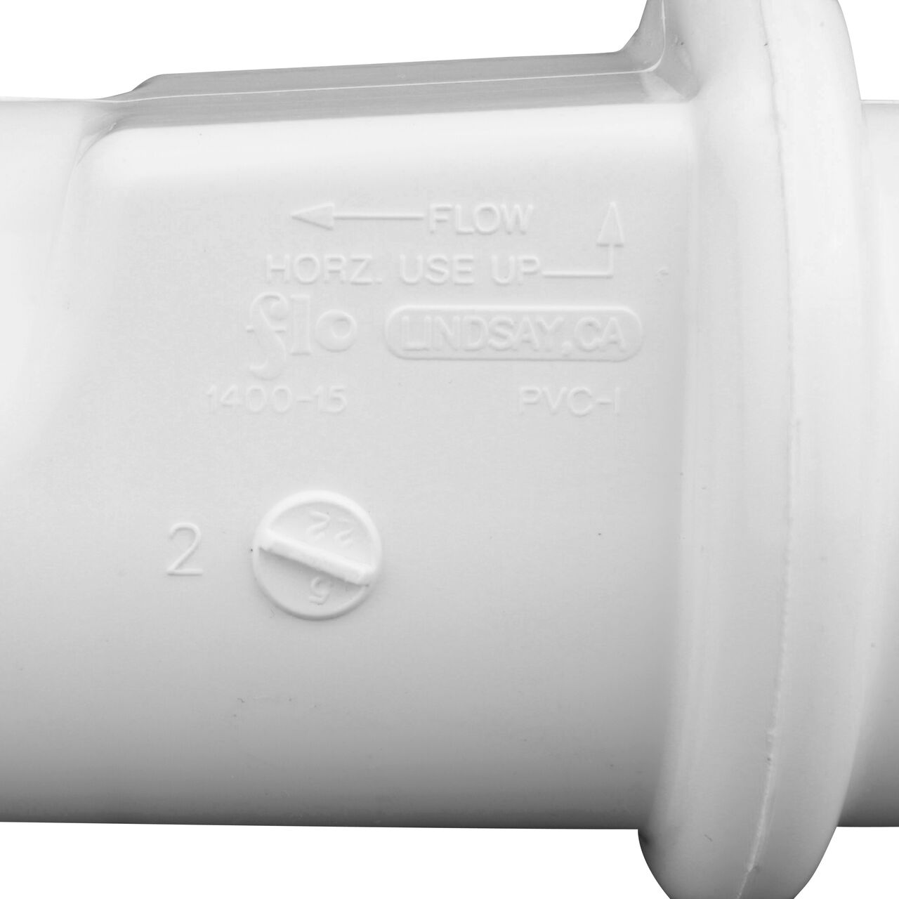 Closeup of the arrow showing water flow on the NDS PVC Sump Pump Swing Check Valve (NDS 1400-15)