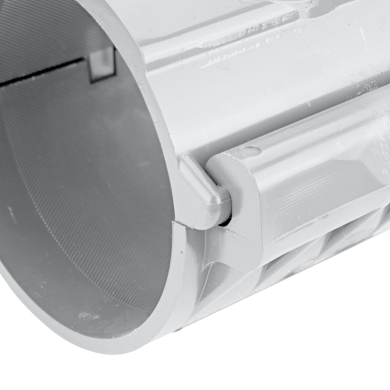 Closeup view of the hinge on the 4 in. NDS Flo-Tap™ Rigid PVC saddle with 1-1/2 in. socket or 2 in. spigot in the closed position (NDS 3240)
