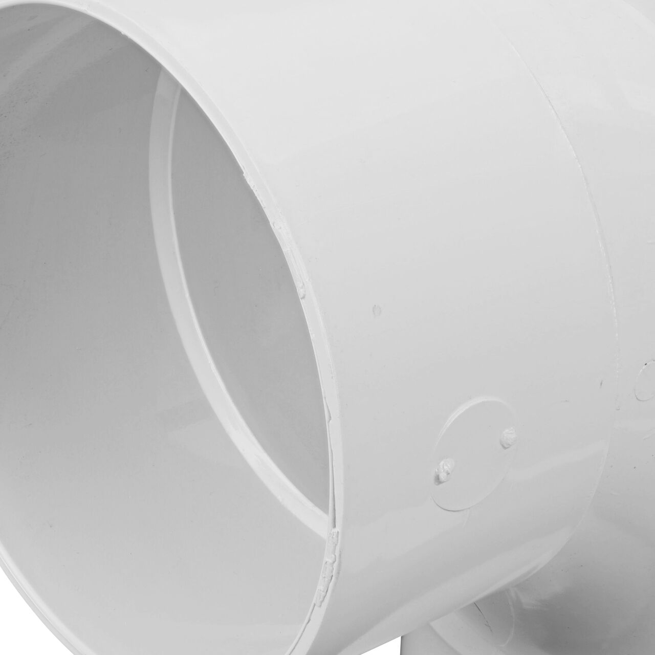 Closeup of the outside of the PVC sanitary tee for 6 in. Sewer and Drain pipes, Hub X Hub X Hub connection (NDS 6P09)
