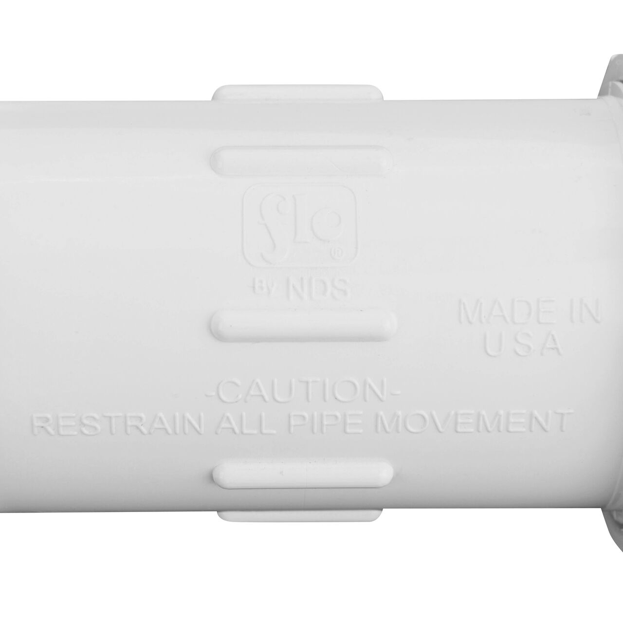Closeup view of the NDS 1-1/2 in. IPS UC Compression Coupling showing that it is made in the USA as part of a complete flow management system for pool, spa, irrigation, and plumbing applications (NDS CCC-0500)
