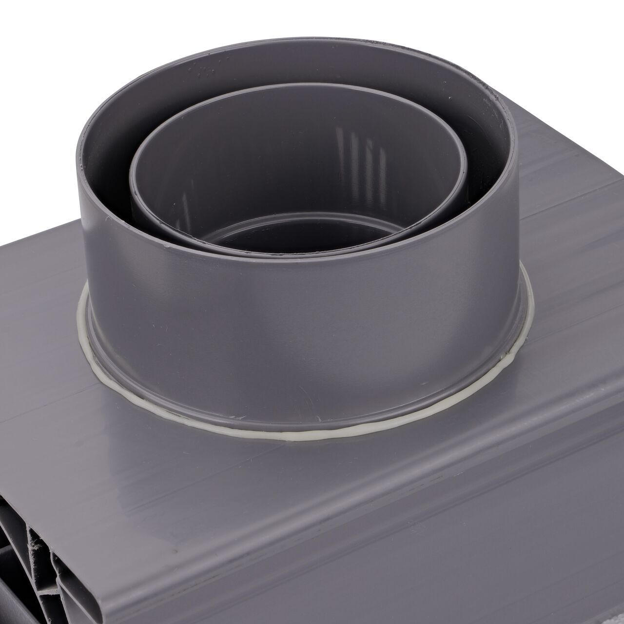 Closeup view of the 3 inch and 4 inch pipe connection end on the bottom of the Spee-D® Channel Drain Bottom Outlet Assembly (NDS 2351*, NDS 2351)
