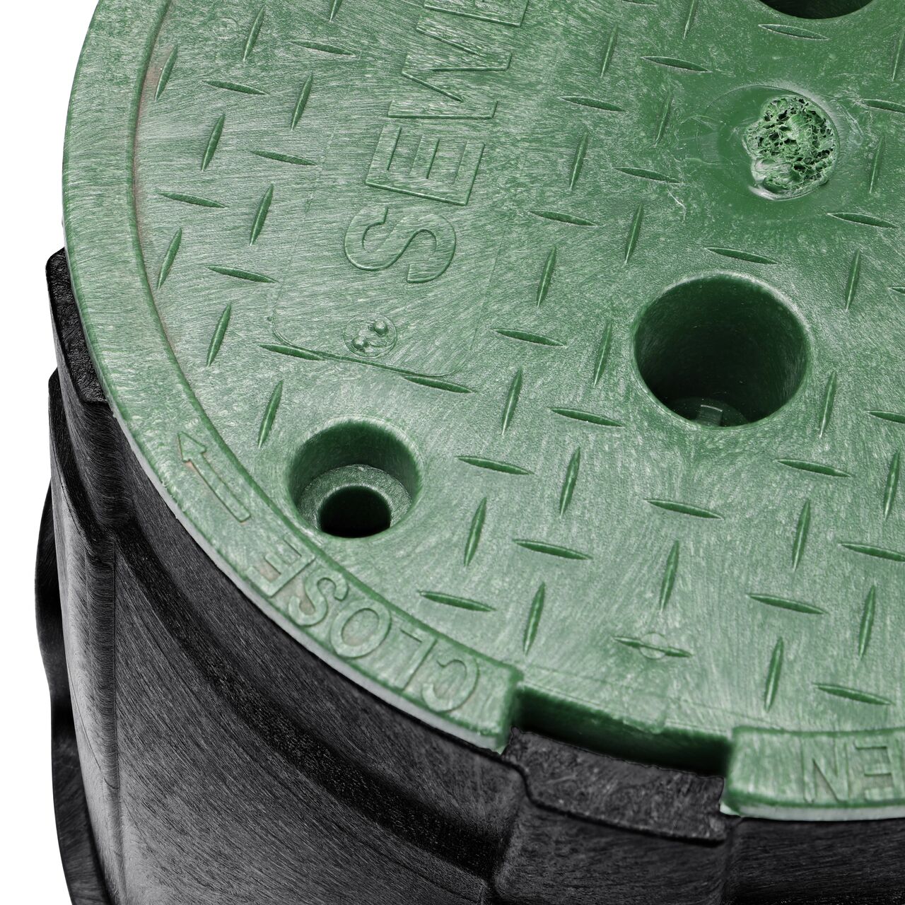 The valve box lid securely in place on the NDS 10 in. Round Pro-Spec® Series Black Box and Green Sewer Cover (NDS 311BCS) keeping components protected against the elements, foot traffic, lawn care equipment, and potential vandalism while keeping them out of sight