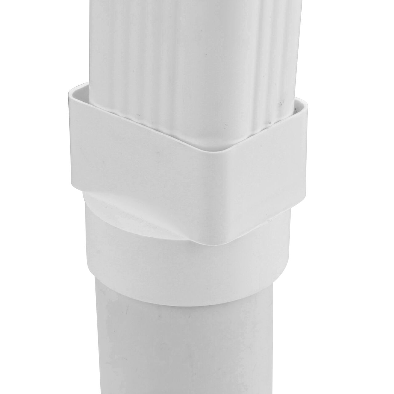 The NDS downspout adapter (NDS 9P09) installed on both a 4 in. DWV/SCH40 pipe and a 3X4 downspout