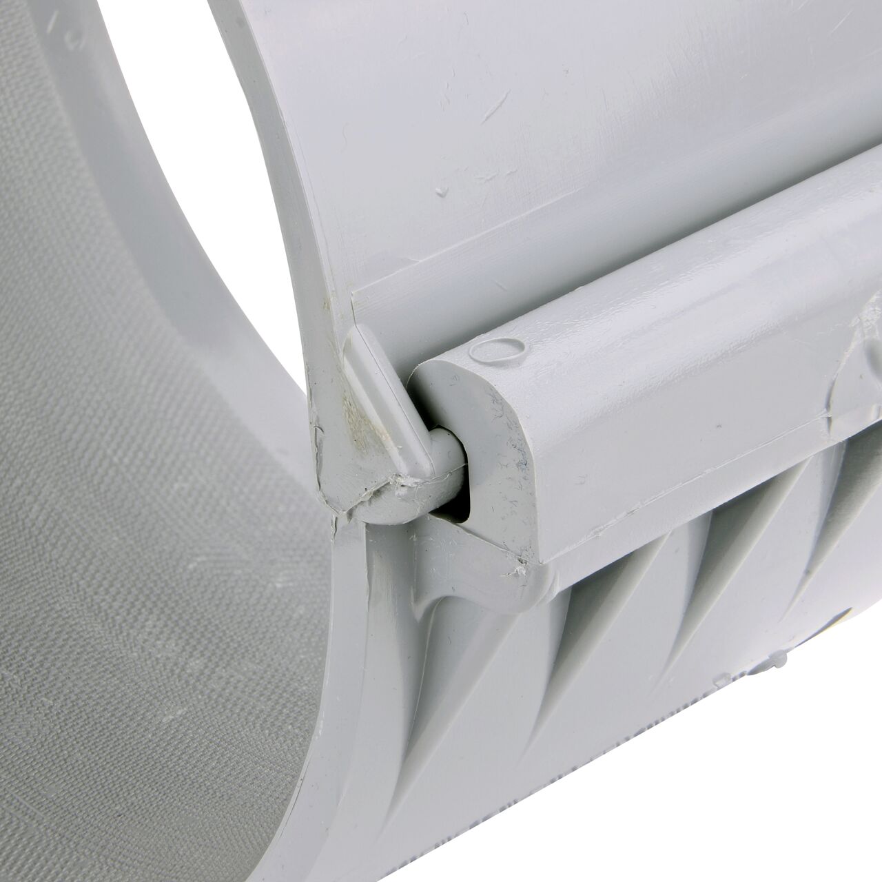 Closeup of the hinge closed on the NDS Clamp-It™ Rigid PVC Saddle with 1-1/2 in. slip connection on top (NDS 458015) for 8 in. PVC pipe