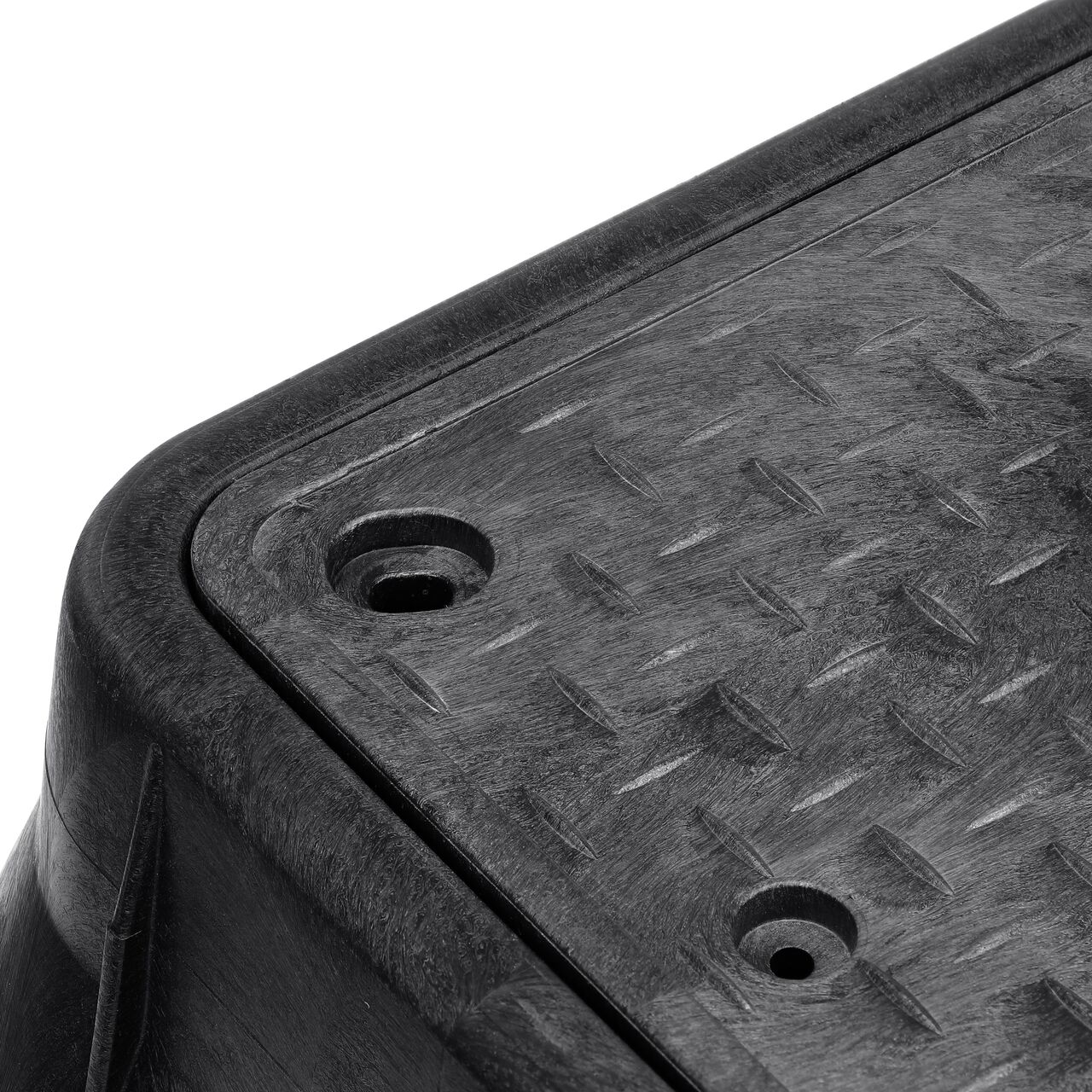 Closeup view of the reinforced edges on the NDS 13 in. X 24 in. Rectangular Standard Meter Box and Cover with Bolt (NDS 121BCDMCIFB)