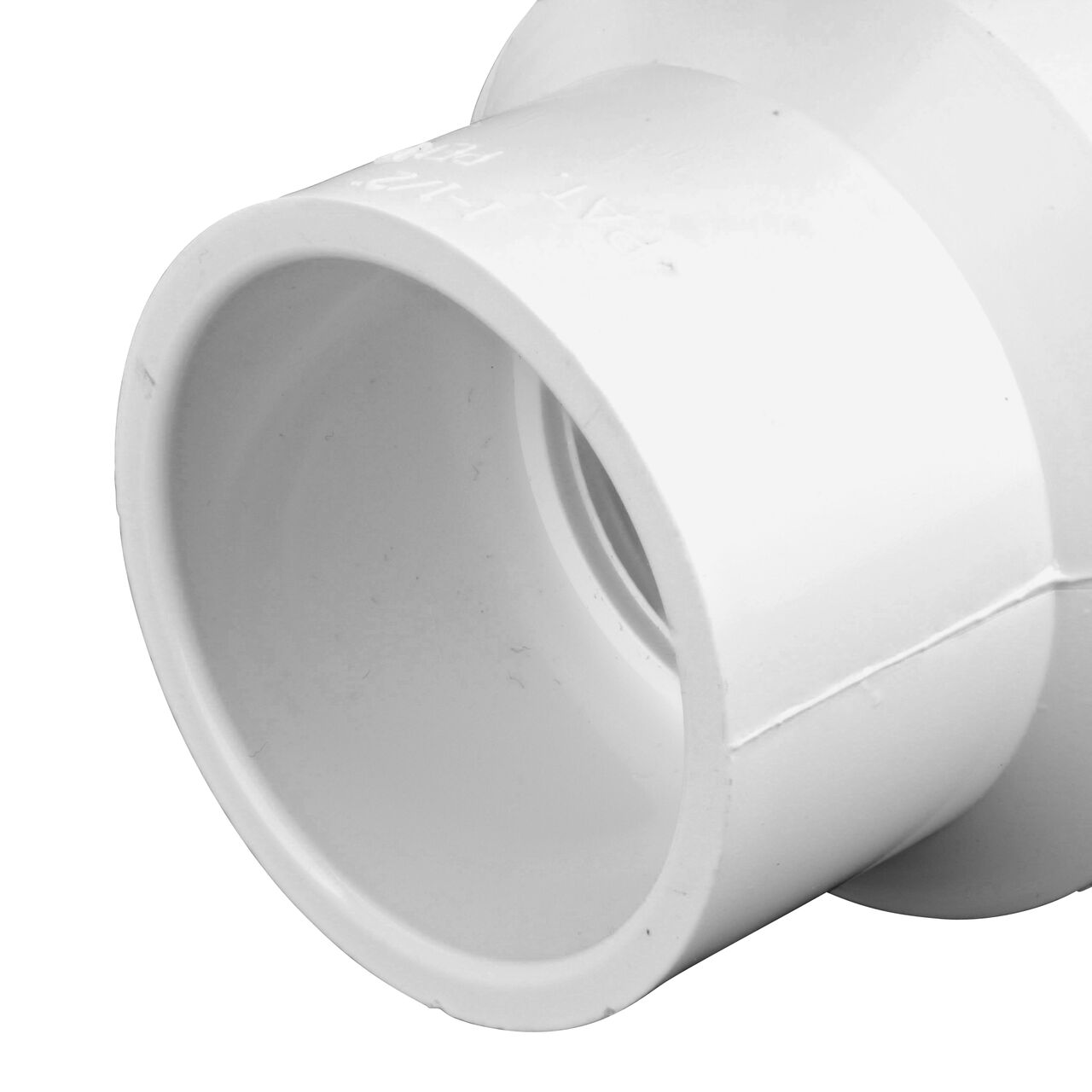 Closeup of the non-union outlet end of the NDS White 1-1/2 in. IPS U X S Checkmate PVC Swing Check and Ball Valve Combination (NDS 2200-15)