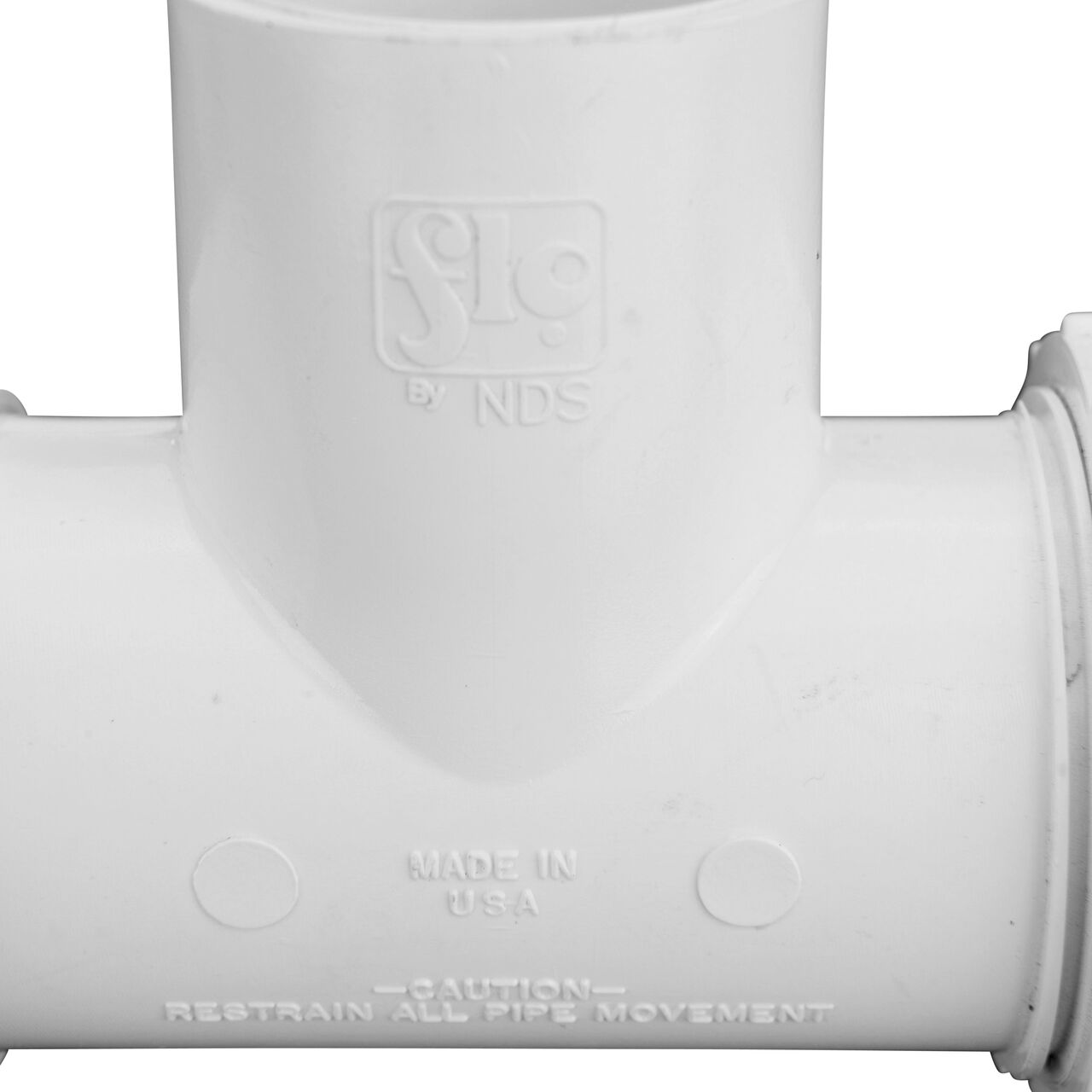 Closeup view of The NDS PVC Threaded Tees 1 in. UC X S IPS showing that it is made in the USA as part of a complete flow management system for pool, spa, irrigation, and plumbing applications (NDS CPT-1000-S)