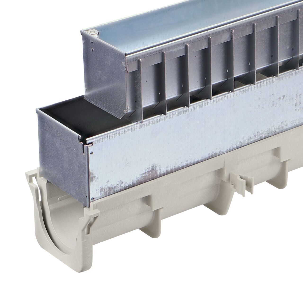 Closeup view of both parts separated on the NDS Galvanized Steel Dura Slope Channel Drain Slot Top Maintenance Unit (DS-STMAINT) installed on the female end of the Dura Slope Channel Drain (NDS DS-091)