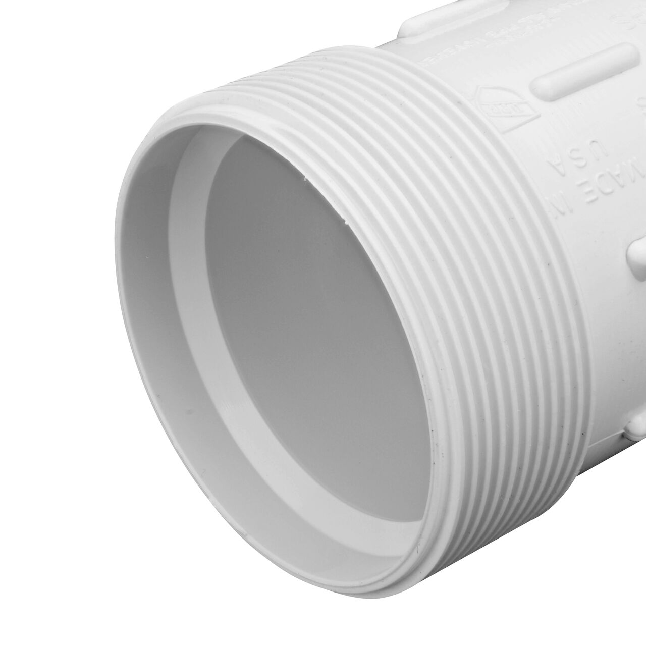 Closeup view of the PVC Compression Adapter, 2 in. IPS UC X 2 in. IPS showing MPT end that threads into FPT pipe which works with most plastic pipe to transport water and provide a leak-resistant connection (NDS CPA-2000)
