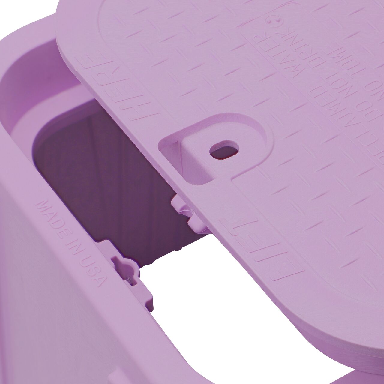 Align the bolt hole on the lid with the bolt hole from the NDS 14 in. x 19 in. Rectangular Pro-Spec® Series Purple Box and Purple Reclaimed Water Cover (NDS 314PBCR) for a secure fit