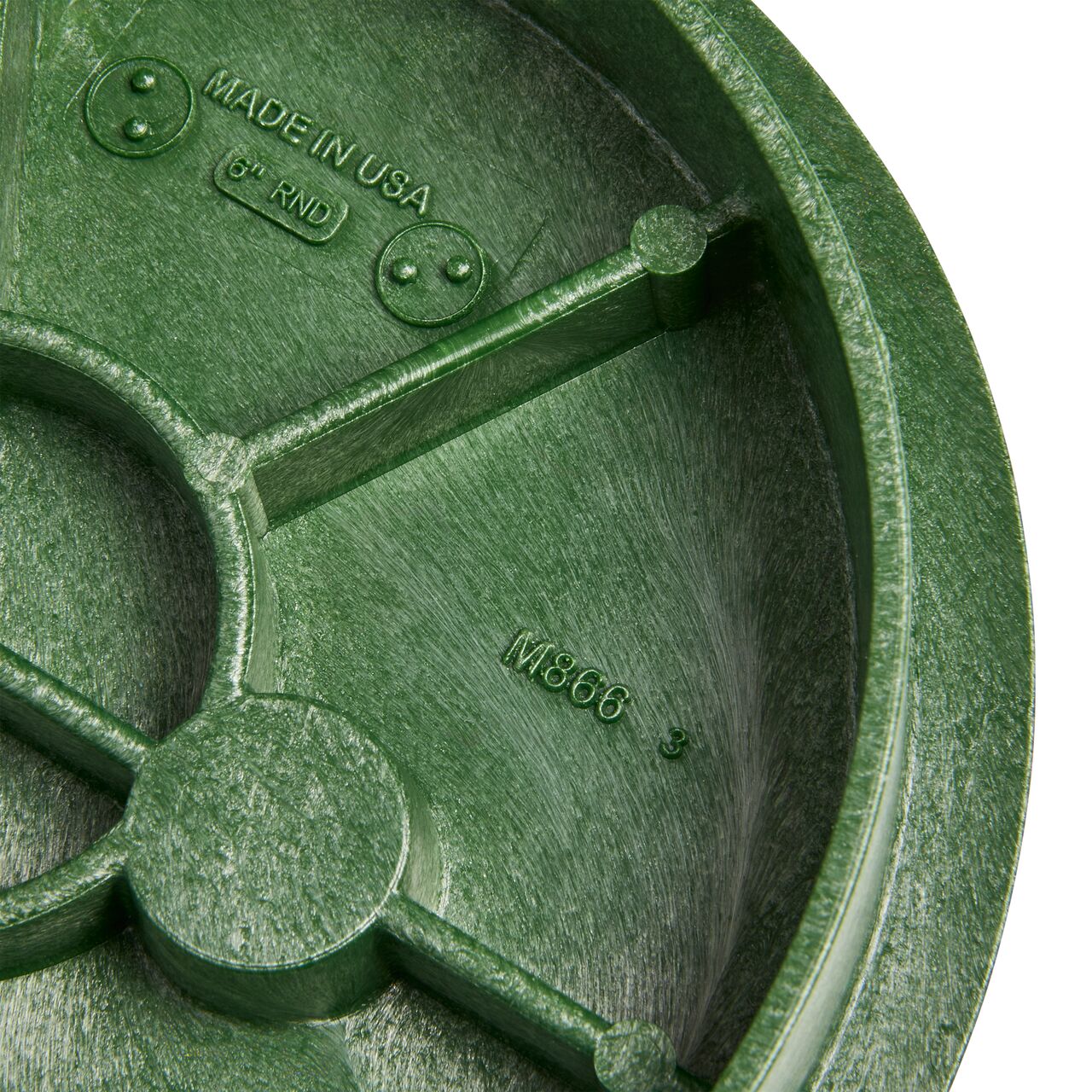 Closeup view of the structural support on the Green Irrigation Control Valve cover for the NDS 6 in. Round Standard Series (NDS 2108BC) that are load rated to withstand pedestrian traffic and the rigors of lawn care equipment