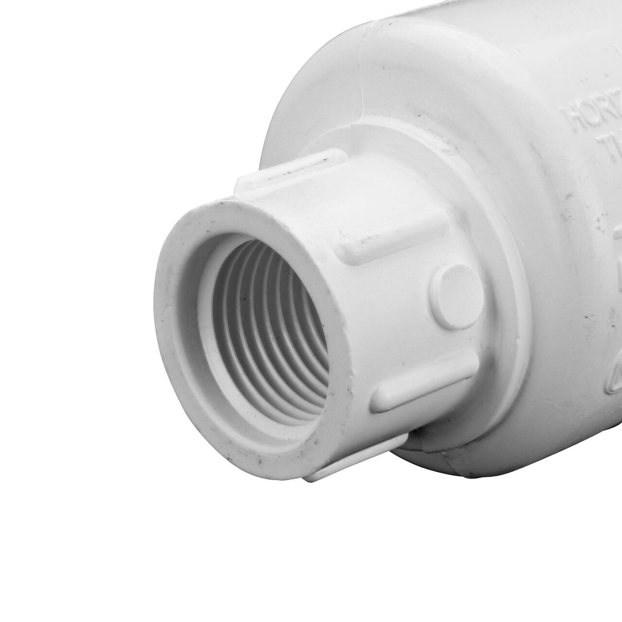 Closeup of the output end of the NDS White 1/2 in. female end by female end PVC Swing Check Valve (NDS 1520-05F) which prevents backflow in pipelines
