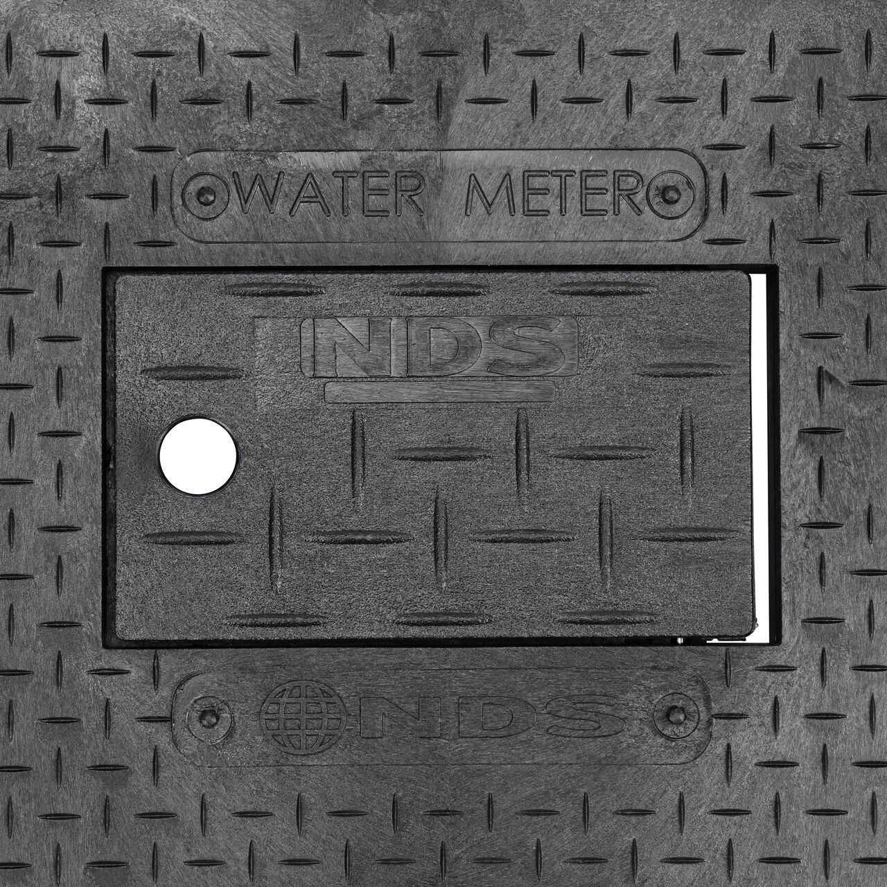 Closeup view of the Water Meter markings and Plastic reader door on the Black Water Meter Drop-in cover for the NDS 14 in. X 19 in. Rectangular Standard Series Meter Cover (NDS D1200-DIRBL)