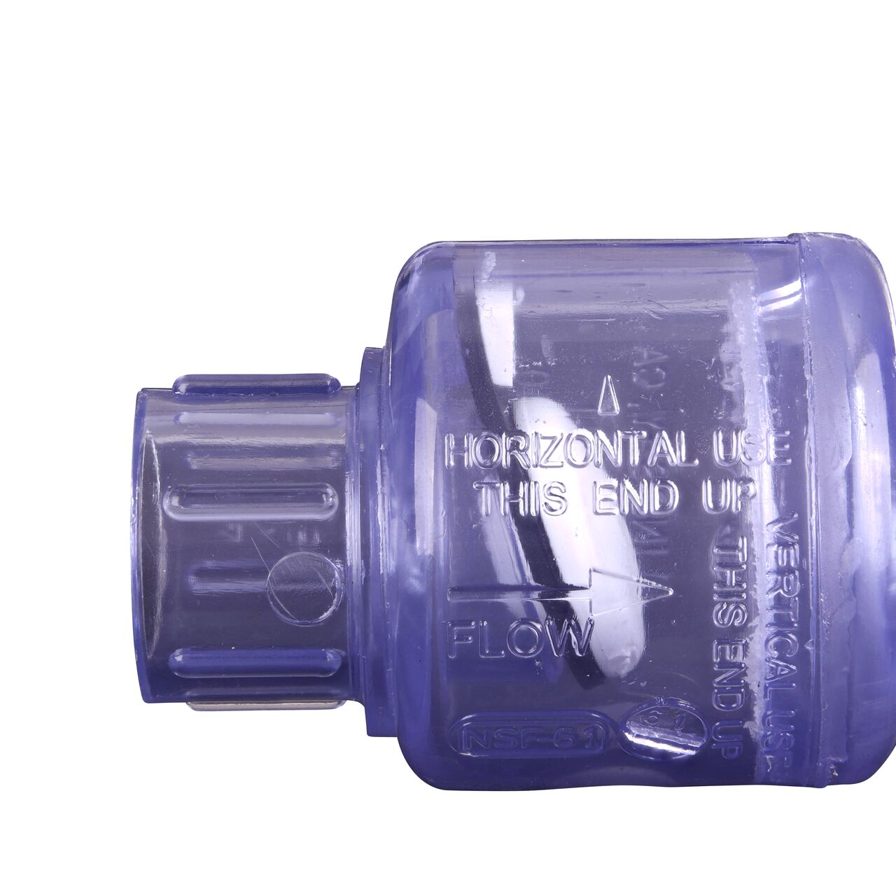 Closeup of the arrow showing water flow direction on the NDS Clear 1/2 in. slip end by slip end PVC Swing Check Valve (NDS 1520C05)