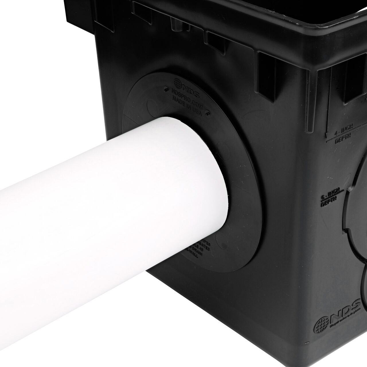 Connect 4 in. sewer & drain pipe over the the locking tab outlet adapter (NDS 1243) on the 12 in. Catch Basin Drain (NDS 1200)