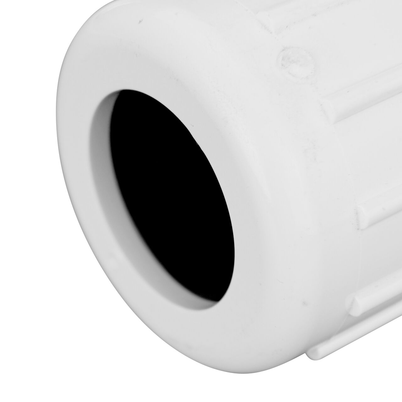 Closeup view of the NDS IPS PVC Male Adapters showing the 3/4 in. compression end with adjustable nut secured which reduces pull-out from pipe (NDS CPA-0750)