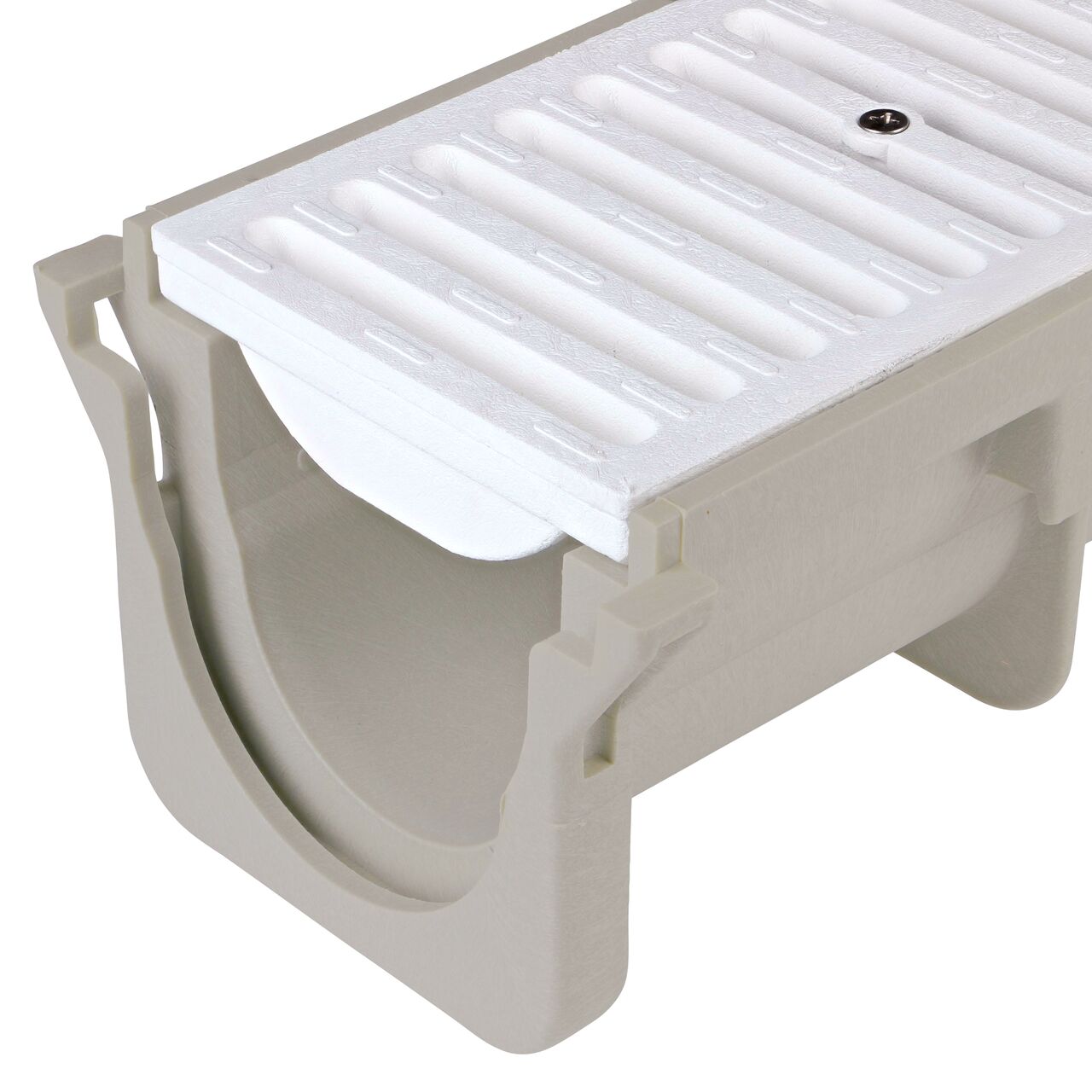 Closeup View of the white plastic Dura Slope™ Channel Drain Grate (NDS 660) installed on the Dura Slope Channel Drain (NDS DS-091)