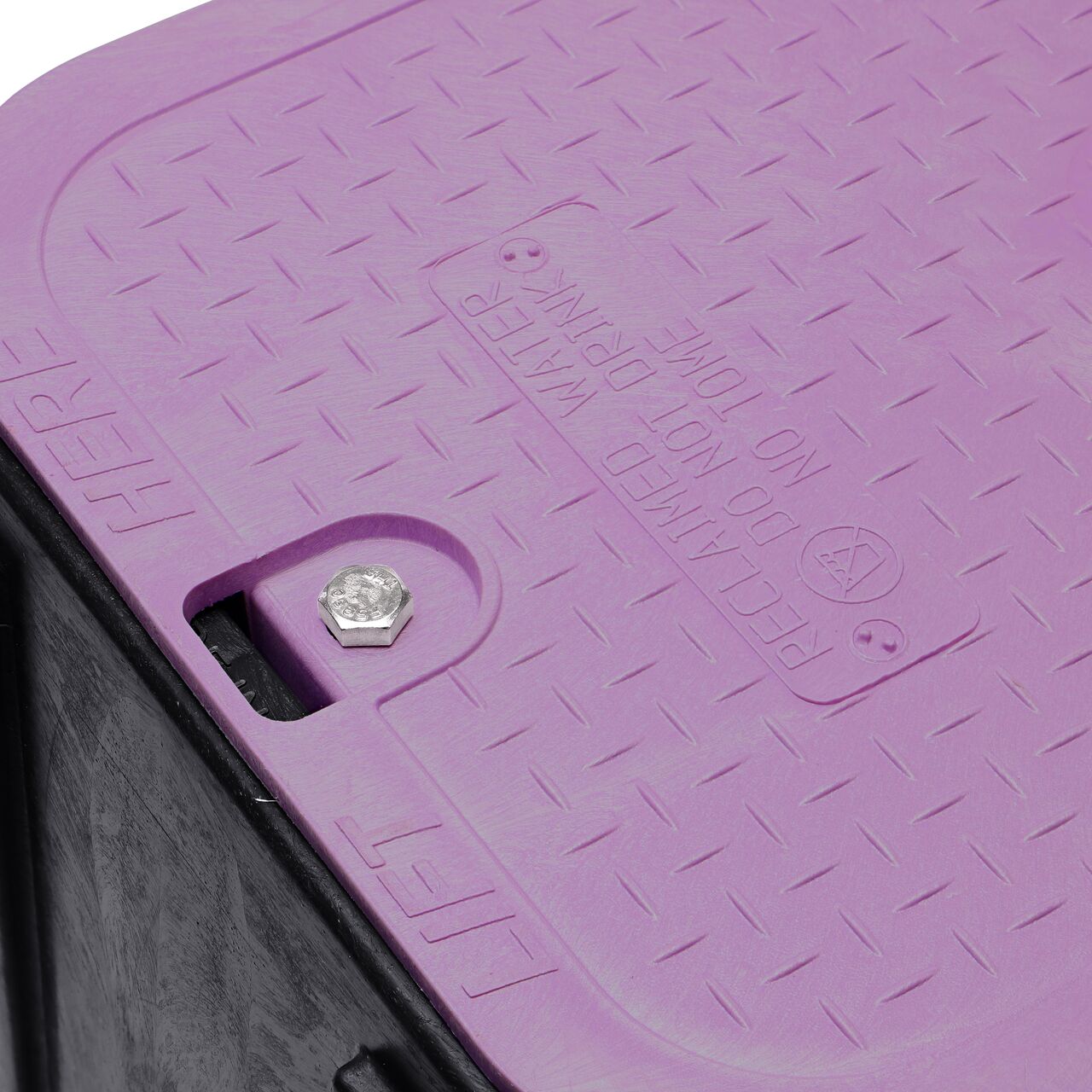 The valve box lid and bolt securely in place on the NDS 14 in. X 19 in. Rectangular Pro-Spec® Series Black Box and Purple Reclaimed Water Cover (NDS 313BCBR) keeping components protected against the elements, foot traffic, lawn care equipment, and potential vandalism while keeping them out of sight