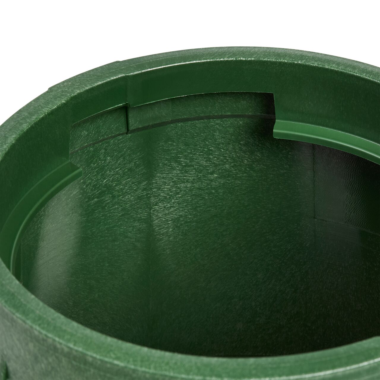 Closeup view of the locking lip that the valve box lid secures in when twisted to a locked position, showing the part to unlock the lid to access the inside on the Green NDS 6 in. Round Standard Series Valve Box (NDS 2108BC)