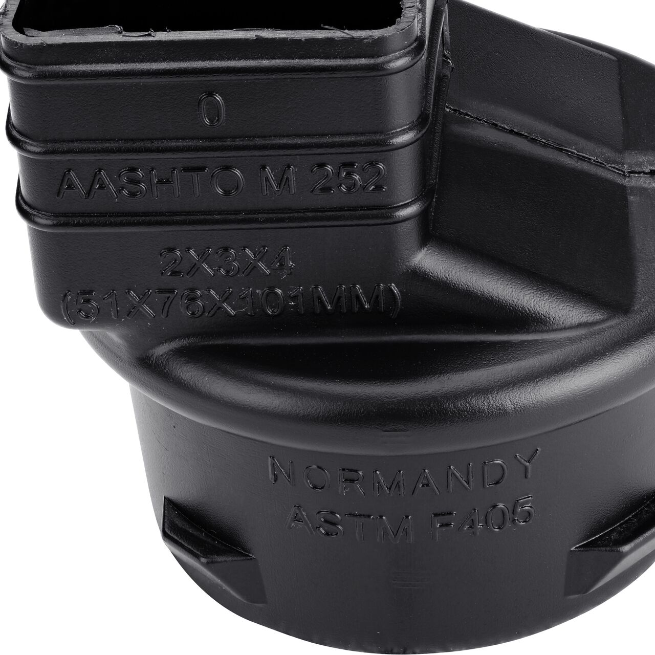 Closeup of the wording on the HDPE Downspout Adapter which transitions 2X3 in. Downspout to 4 in. Hub (NDS 234CDS)
