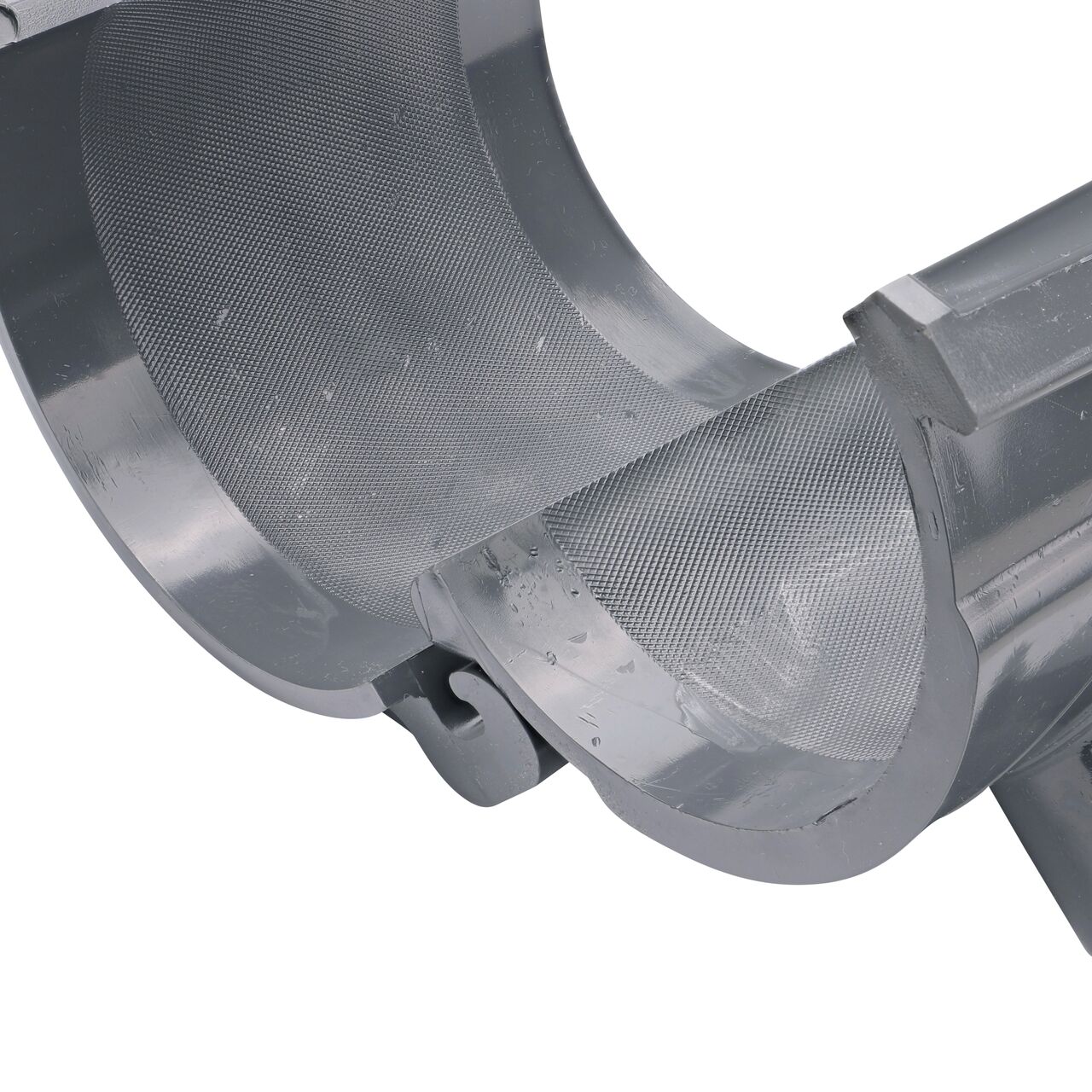 Closeup of the hinge open on the NDS Clamp-It™ Rigid PVC Saddle with 1-1/2 in. slip connection on top (NDS 454015) for 4 in. PVC pipe