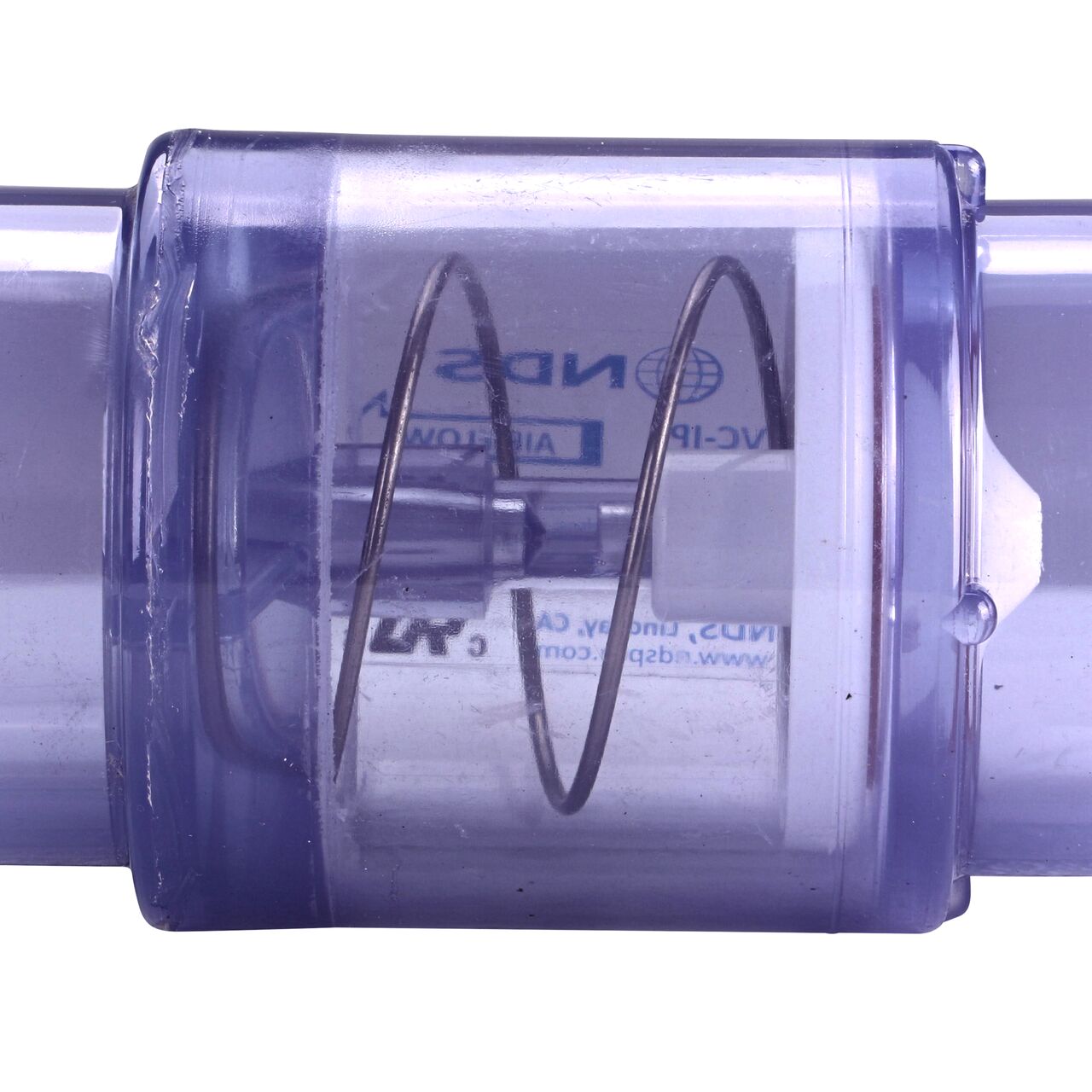 Closeup of the spring of the the 3 lb spring closes the flapper to prevent water from flowing the wrong direction in the NDS Clear 1-1/2 in. slip end by 2 in. spigot end PVC Air Check Valve (NDS 1053C20)