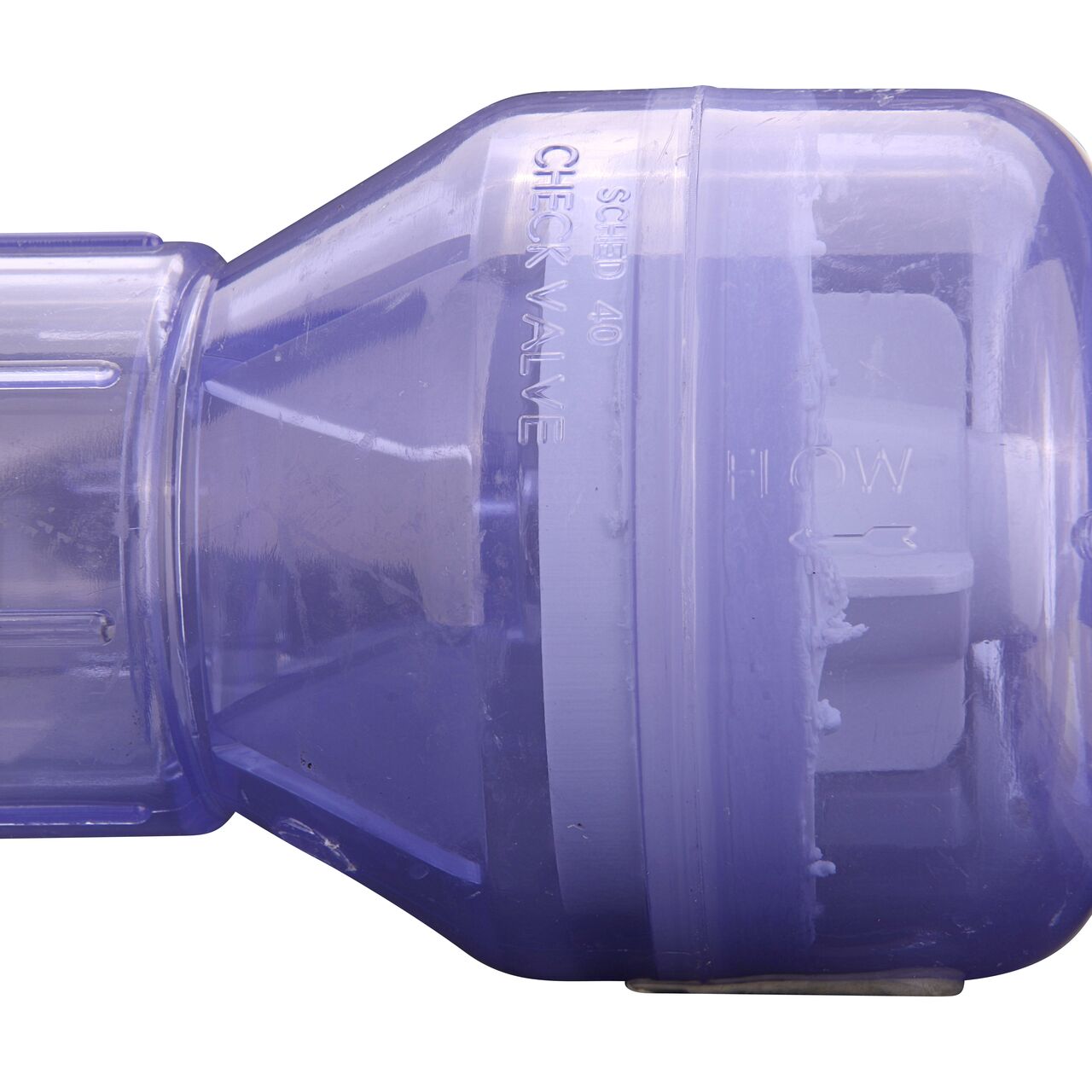 Closeup of the arrow showing water flow of the NDS Clear 2 in. slip end by slip end PVC Spring Check Valve (NDS 1011C20)
