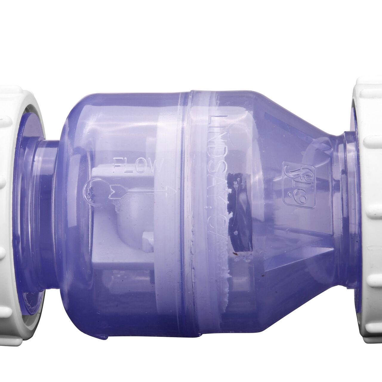 Closeup of the arrow showing water flow direction on the NDS Clear 1 in. slip end by slip end with 1/2 lb. spring PVC True Union Spring Check Valve (NDS 1700C10)