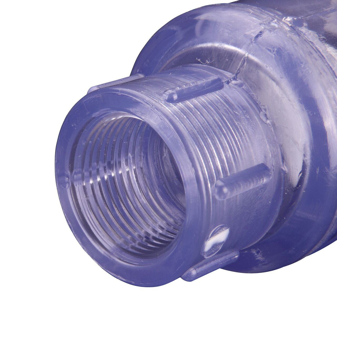 Closeup of the inlet end of the slip NDS Clear 3/4 in. female end by female end PVC Swing Check Valve (NDS 1520C07F) which prevents backflow in pipelines