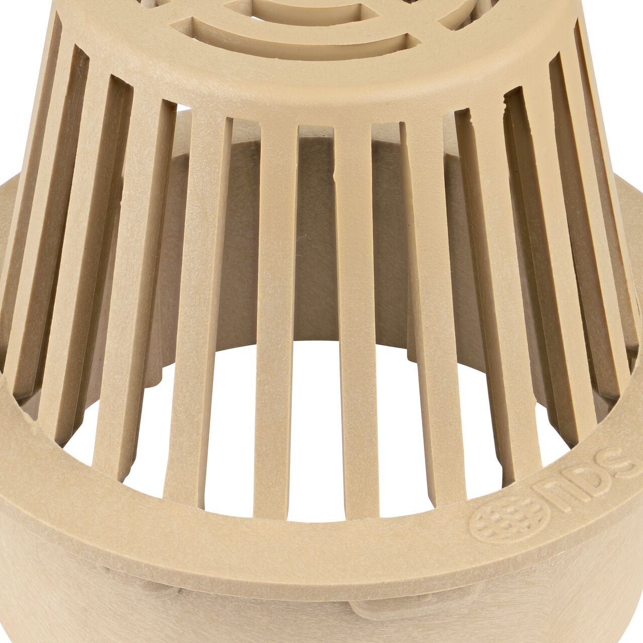 Closeup of the grate design on the NDS 6 in. Atrium Grate made of sand plastic (NDS 90S, H90S)