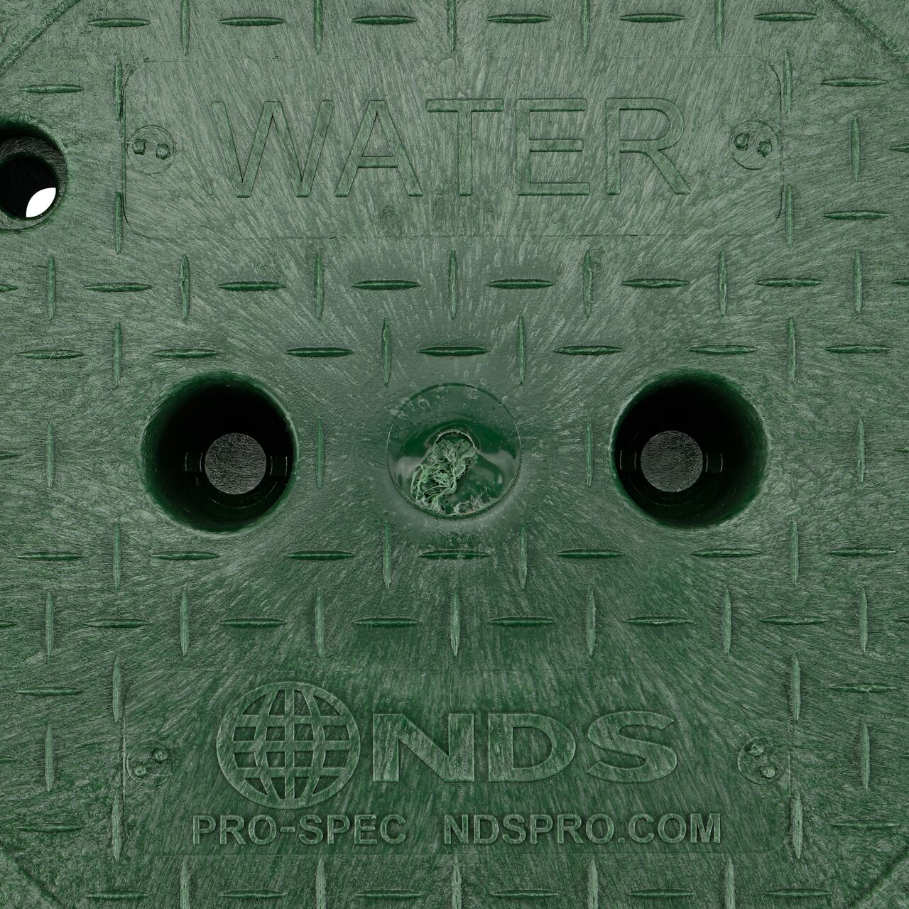 Closeup view of the Water markings on the Green Water cover (NDS 311CW) for the NDS 10 in. Round Pro-Spec® Series Valve Box