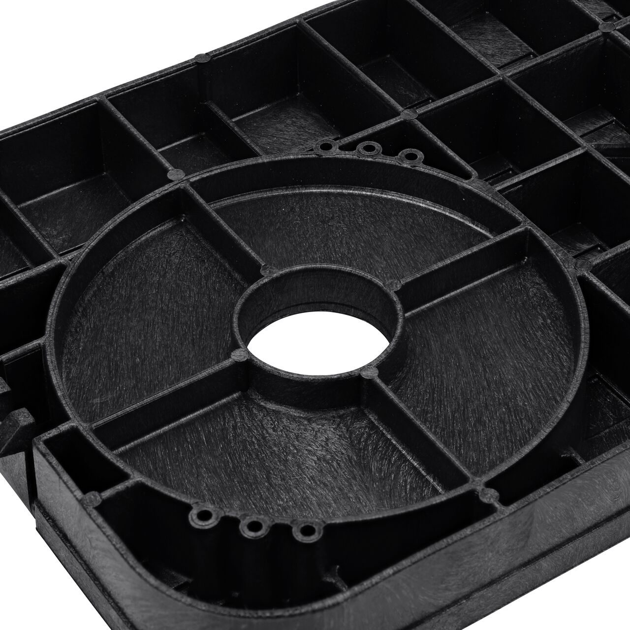 Closeup view of the underside of the 2 in. touch reader hole on the NDS Black Drop-in AMR locking Water Meter Cover (NDS D12-TAMRL)