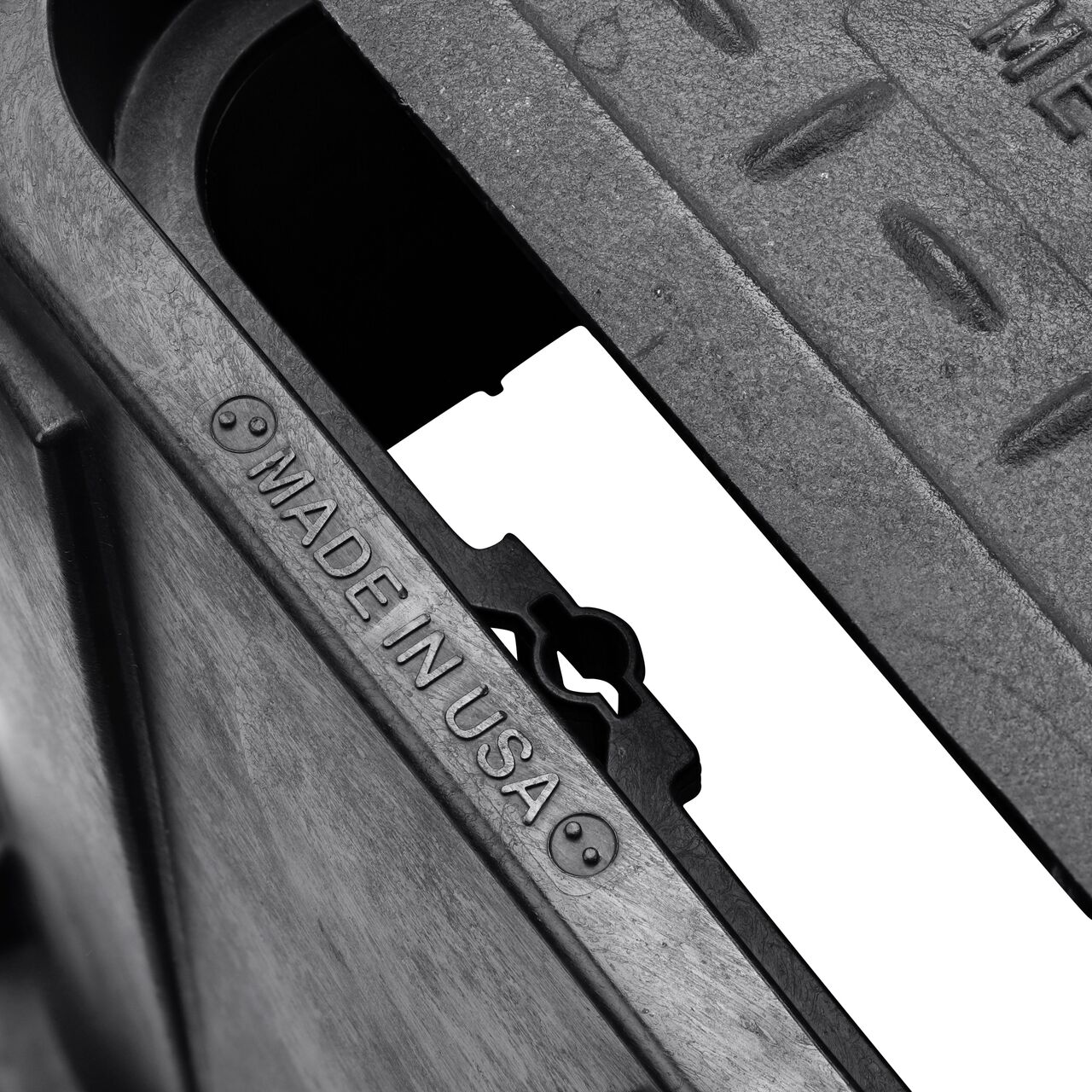 Align the bolt hole on the lid with the universal locking mechanism hole from the NDS 14 in. X 19 in. Rectangular Standard Series Black Meter Box and Black Water Meter Cover (NDS D1200-CICIR) for a secure fit