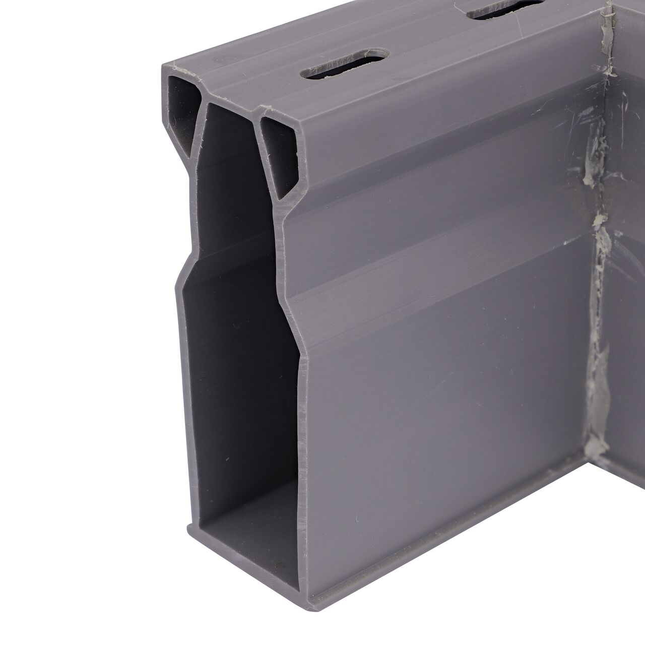 Closeup of the grate design of the Gray Micro Channel Drain 90 degree elbow and inegrated grate (NDS 8383)
