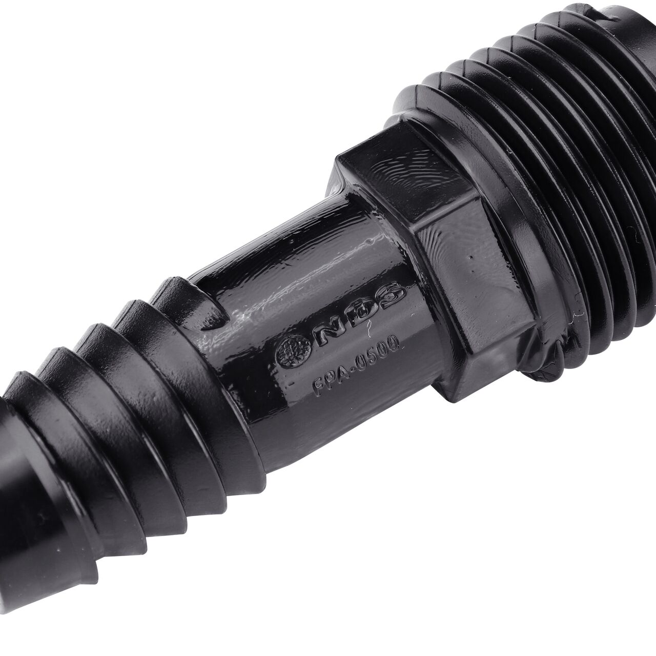 Closeup view of the 1/2 in. MPT X Barbed Flexee Swing Pipe Adapter that provides a connection point between fittings and irrigation supply tubing installed above ground surface for effective water distribution