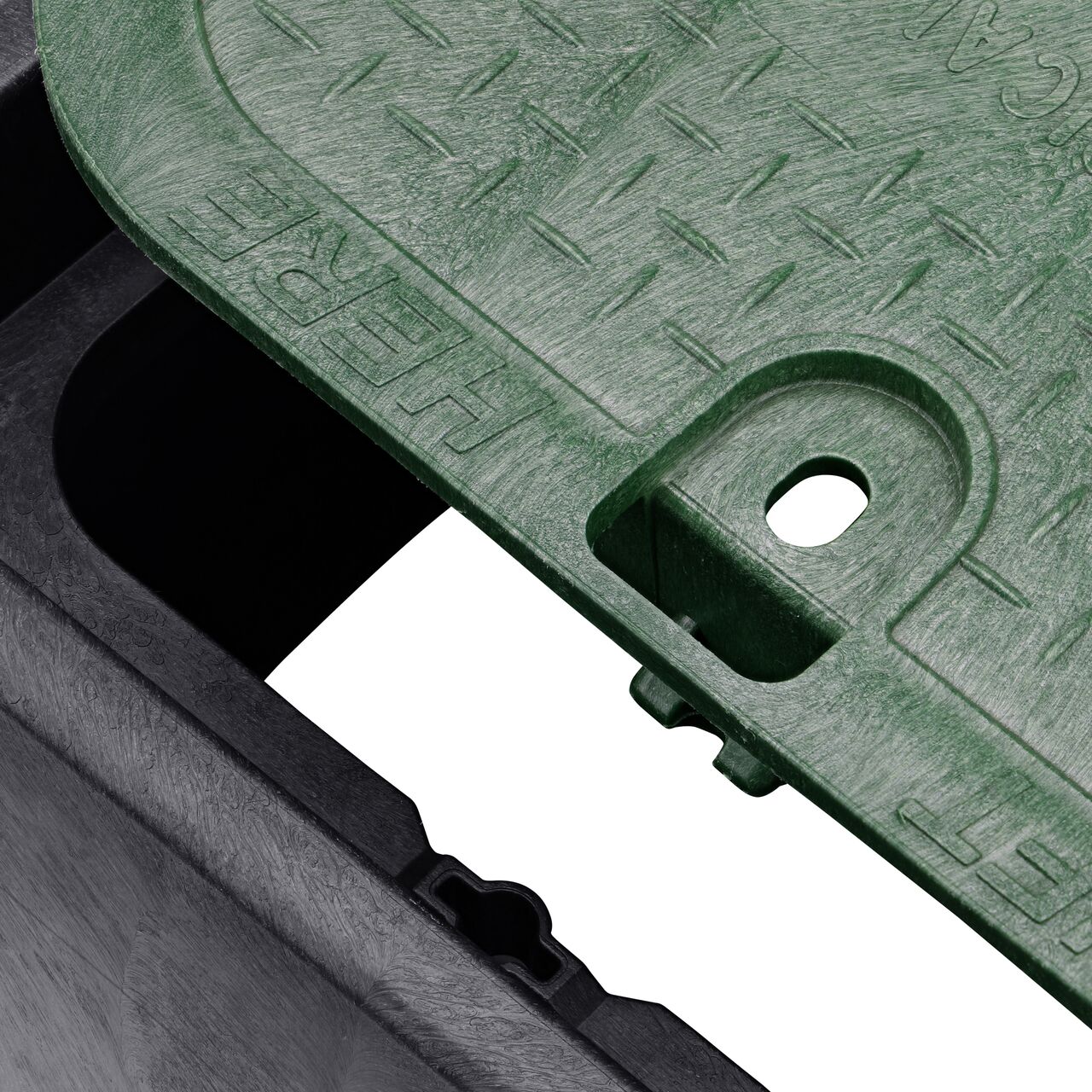 Align the bolt hole on the lid with the universal locking mechanism hole from the NDS 14 in. X 19 in. Retangular Standard Series Black Box and Green Electrical Cover (NDS 113BCE) for a secure fit