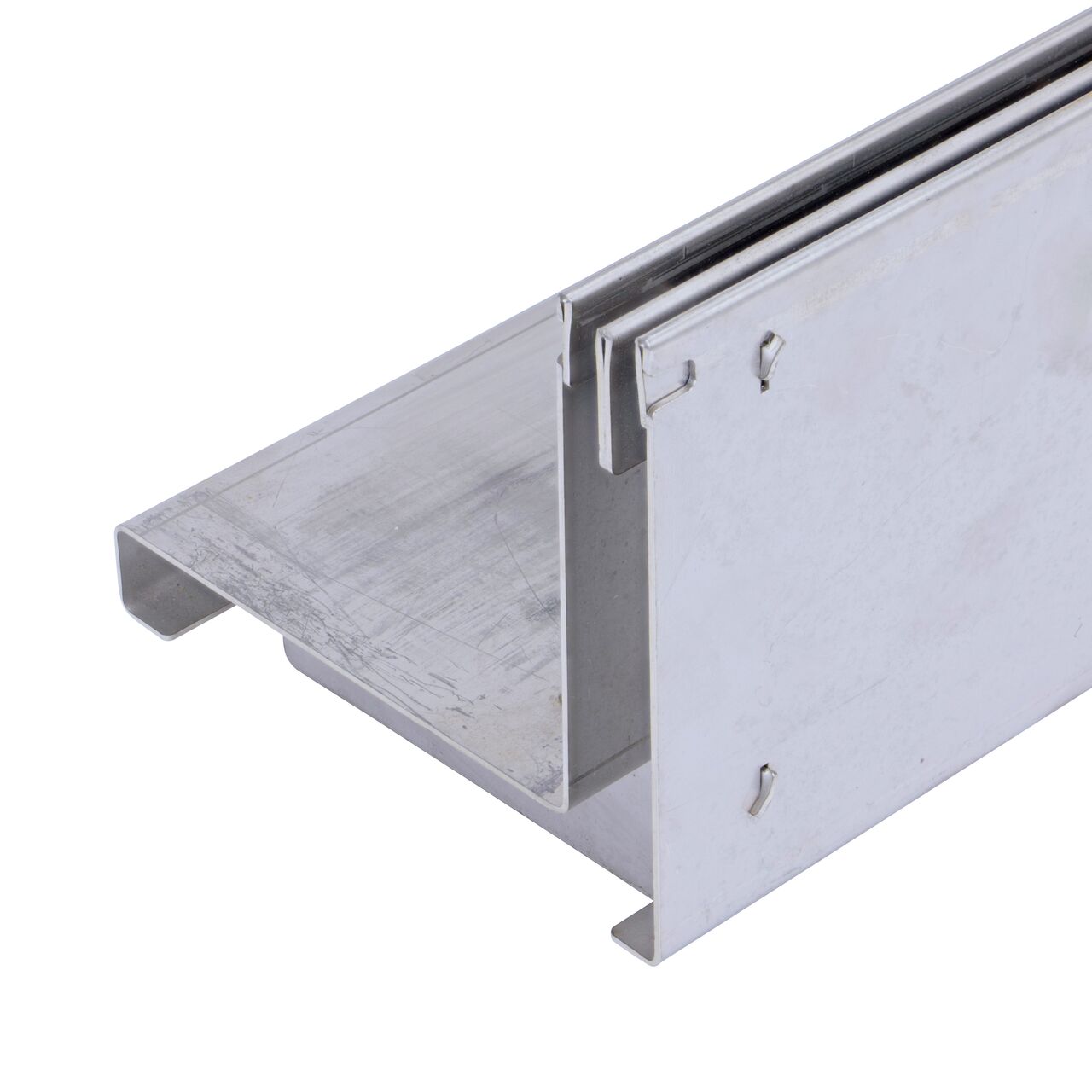 Close up view of the edge of the NDS Dura Slope stainless steel slot top channel drain grate (NDS DS-SS-ST500) from the back