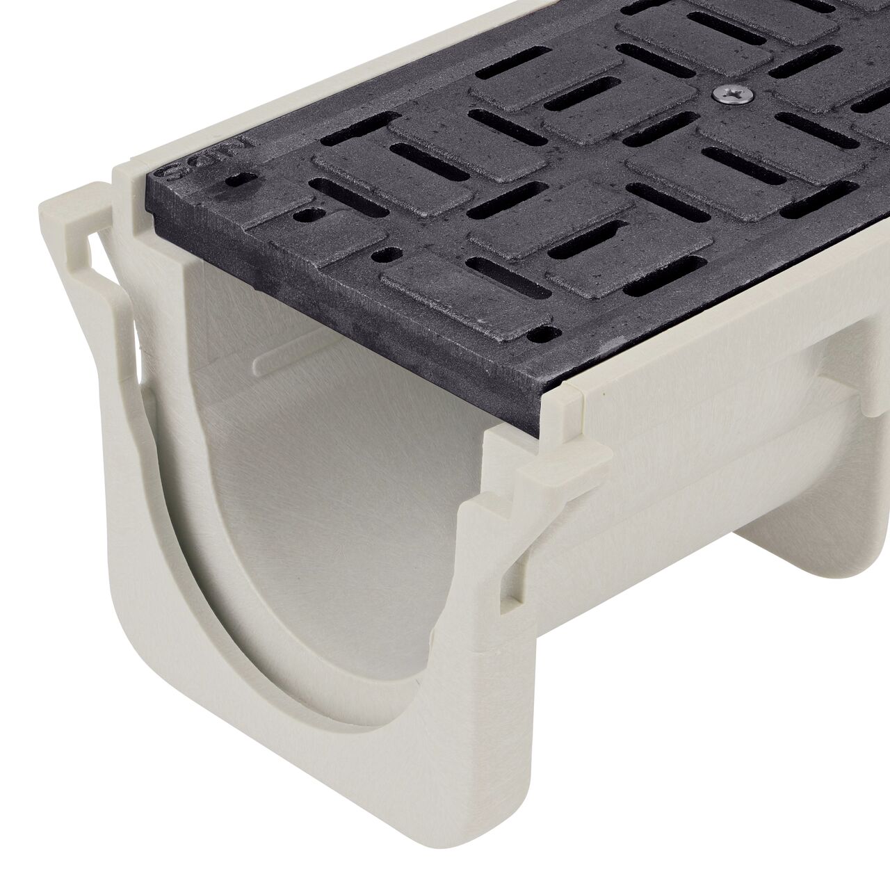 Closeup View of the ductile iron brick pattern Dura Slope™ Channel Drain Grate (NDS DS-604) installed on the Dura Slope Channel Drain (NDS DS-091)