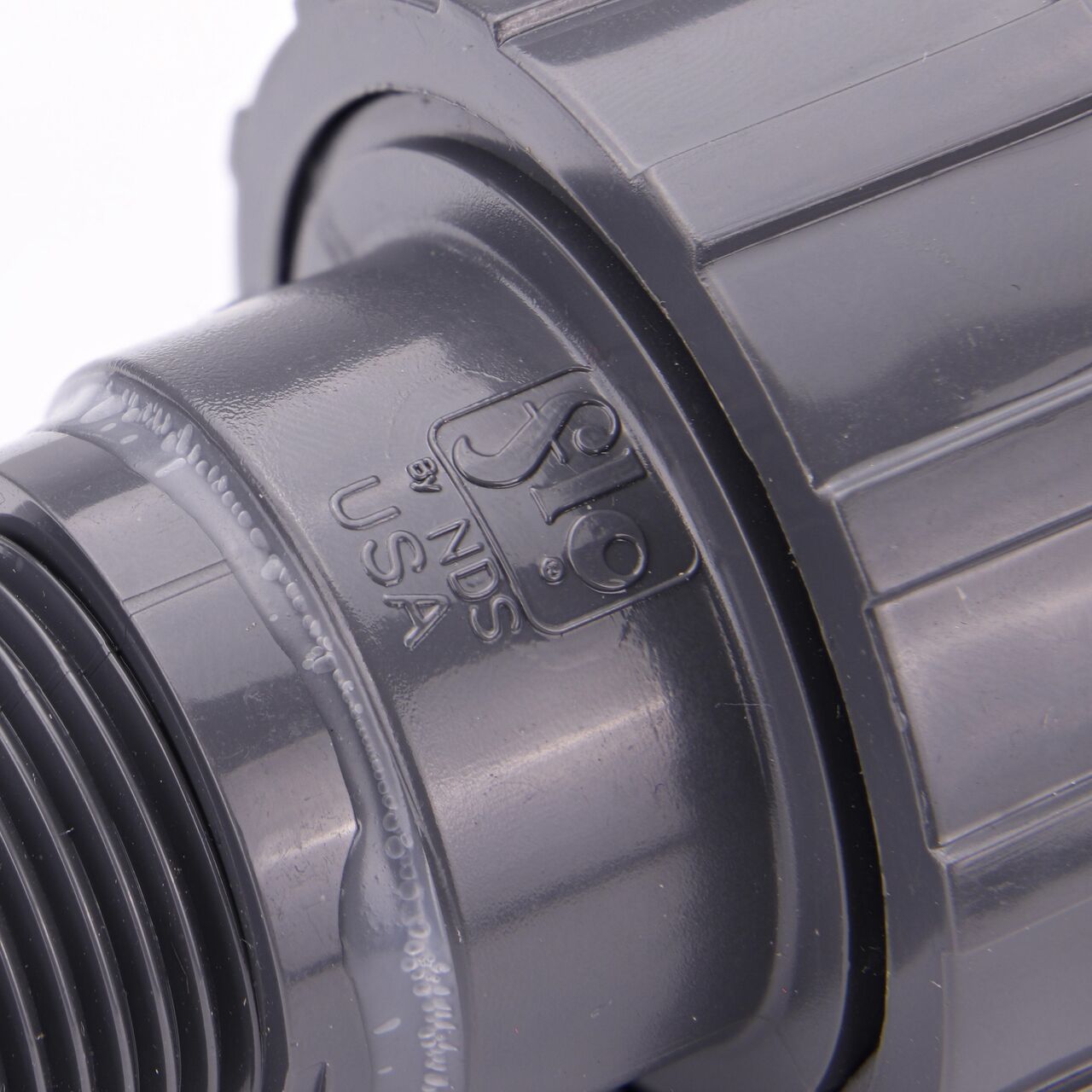 Close up view of the NDS 3/4 in. PVC Union showing NDS brand a leader in flow management solutions and the preferred choice of professionals since 1972 mark (NDS U-0750-SM)