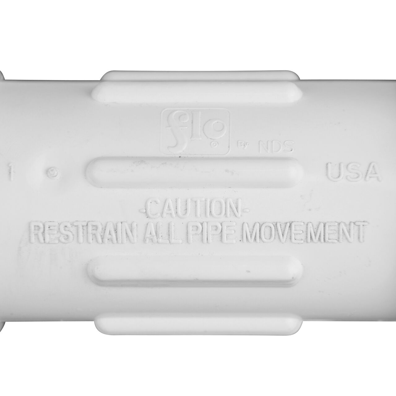 Closeup view of the NDS 1/2 in. IPS UC Compression Coupling showing that it is made in the USA as part of a complete flow management system for pool, spa, irrigation, and plumbing applications (NDS CCC-0500)