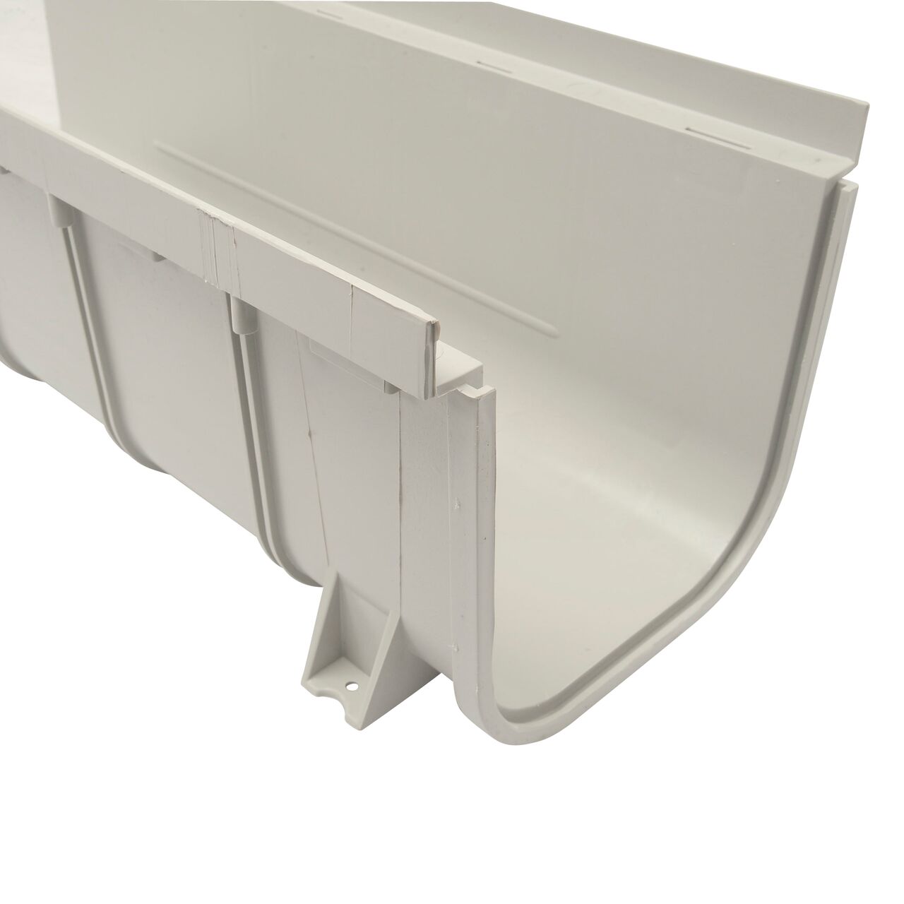 Closeup view of the 8 in. Pro Series Channel Drains showing where they connect together with interlocking joints on ends; grate sits on grate seat (NDS 833)