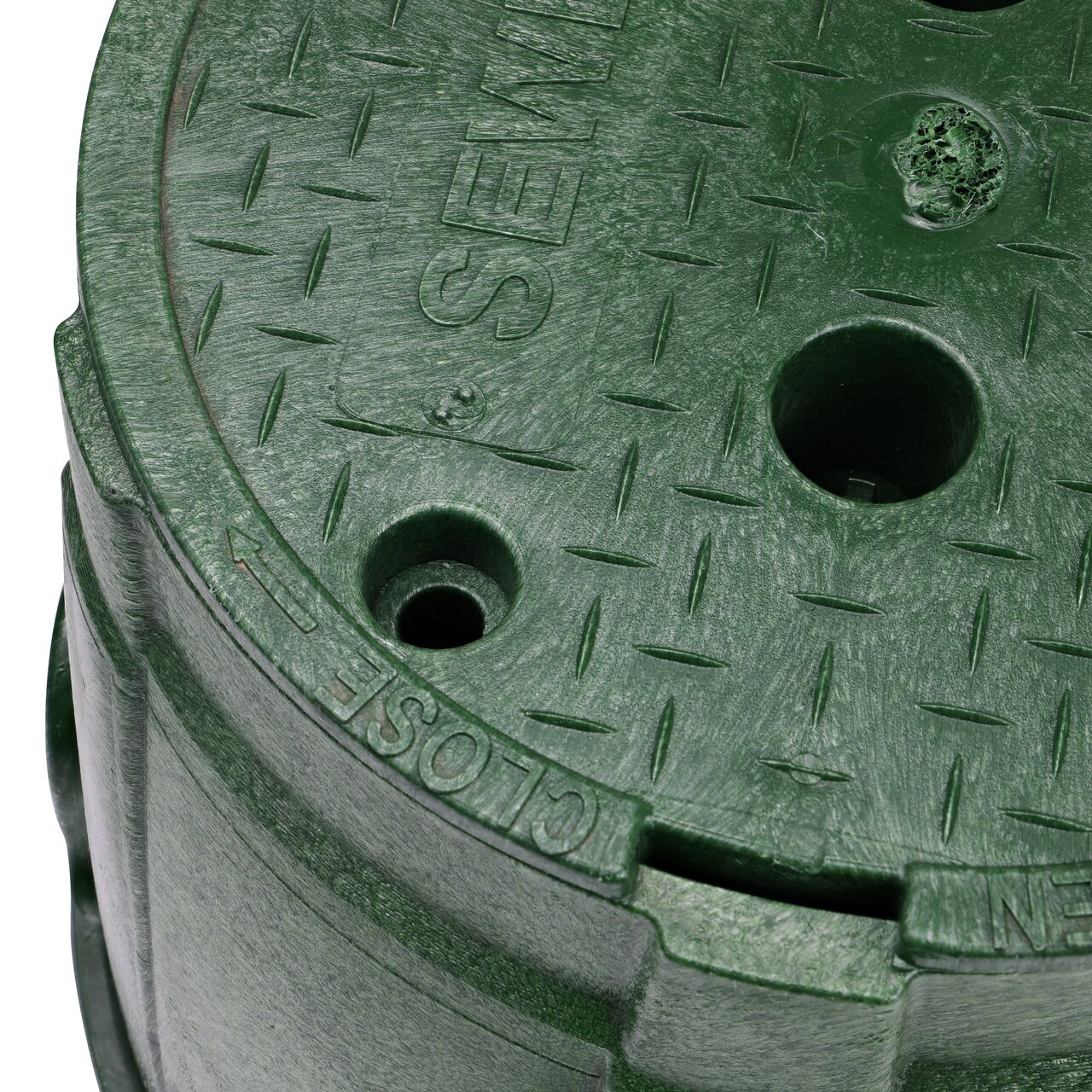 The valve box lid securely in place on the NDS 10 in. Round Pro-Spec® Series Green Box and Green Sewer Cover (NDS 312BCS) keeping components protected against the elements, foot traffic, lawn care equipment, and potential vandalism while keeping them out of sight