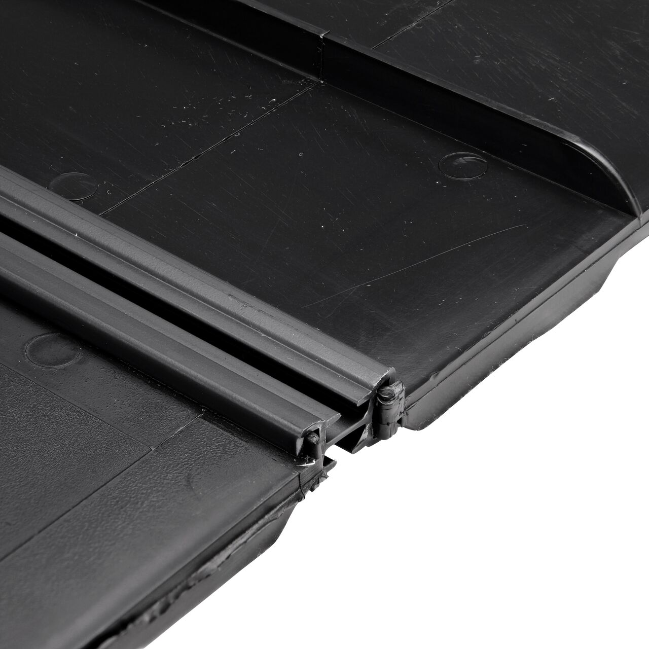 Slide the end of the second NDS Root Barrier Panel all the way through in the other slot of the provided joiner strips (NDS EP-1250, NDS EP-1850, NDS EP-2450, NDS EP-3650)