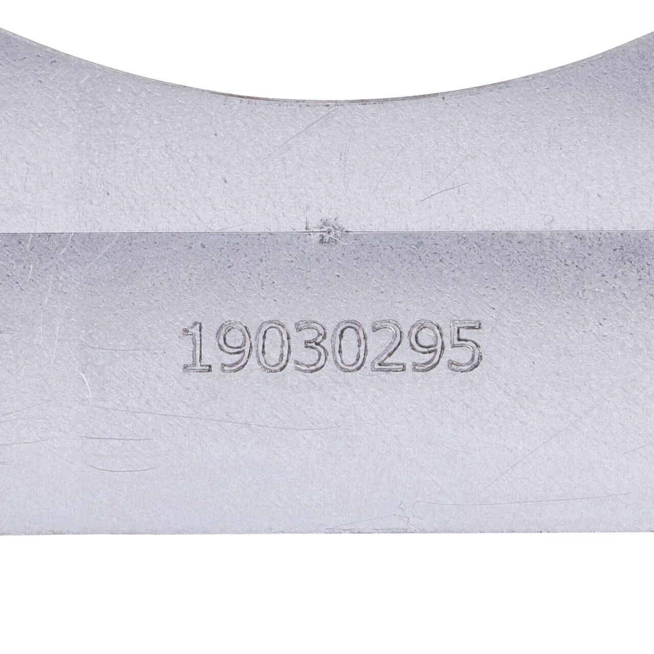 Closeup view showing how each Galvanized Steel BG-FILCOTEN® 300 Trench Drain Step Connector Plate (NDS 19030295) is stamped on the product number for easy identification