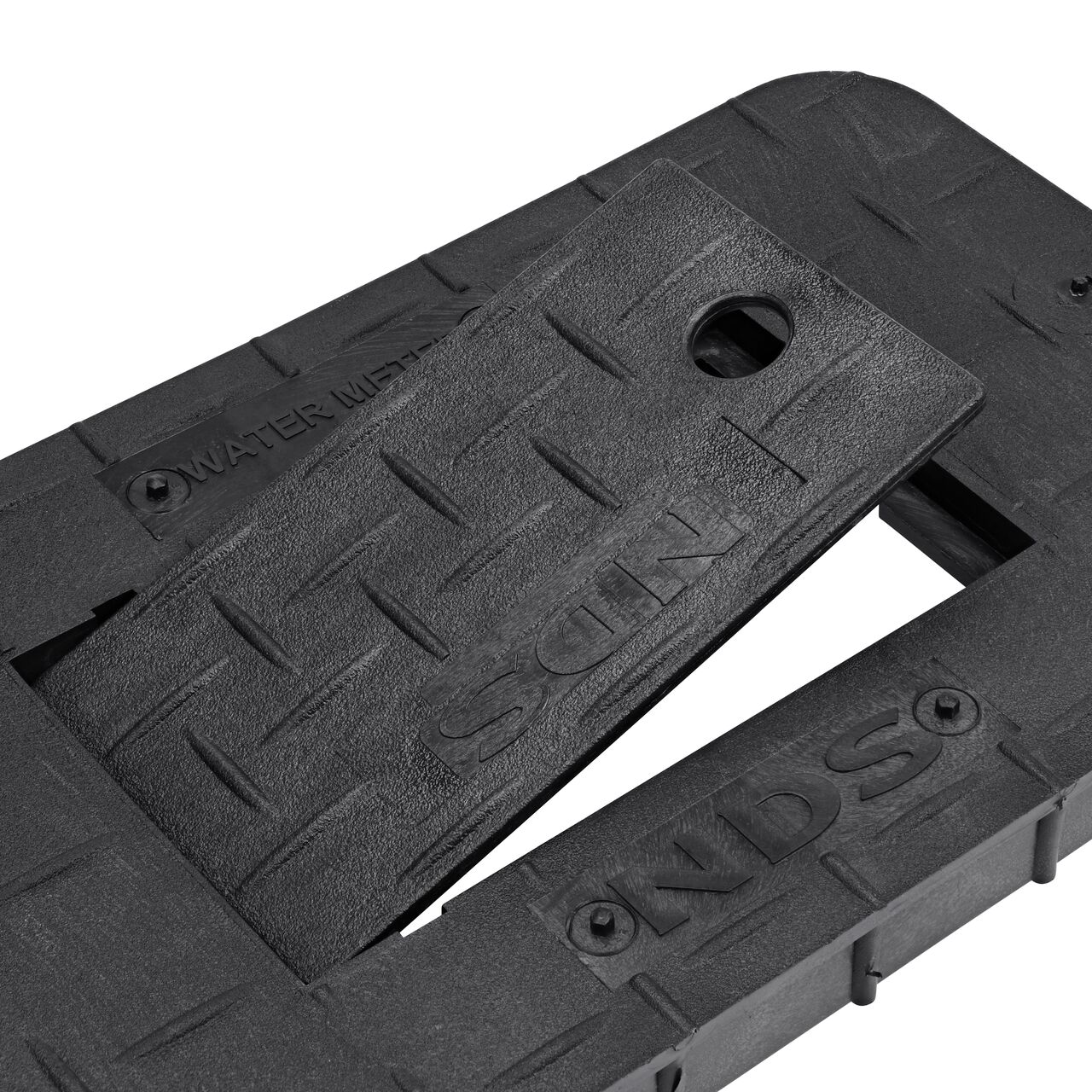 Close up view of the hinged side of the plastic reader door on the Water Meter Black Drop-in 10 in. X 15 in. Rectangular Standard Series Meter Cover which allows for easy meter reading (NDS D1000-RBL)