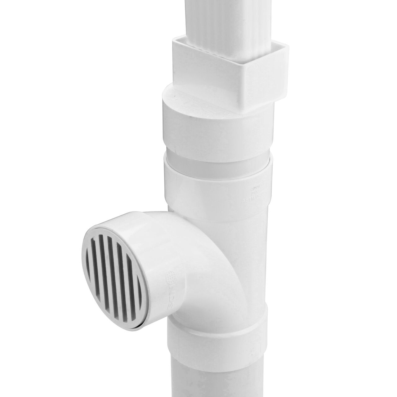 Assembled downspout assembly with the NDS 2X3 in. Downspout to 4 in. S&D Hub downspout adapter (NDS 9P04) installed with a 2X3 downspout, 4 in. S&D pipe, NDS Sanitary Tee (4P09) with a NDS 4 in. round S&D pipe & fitting grate (9P11) attached, and an additional 4 in. S&D pipe at the bottom