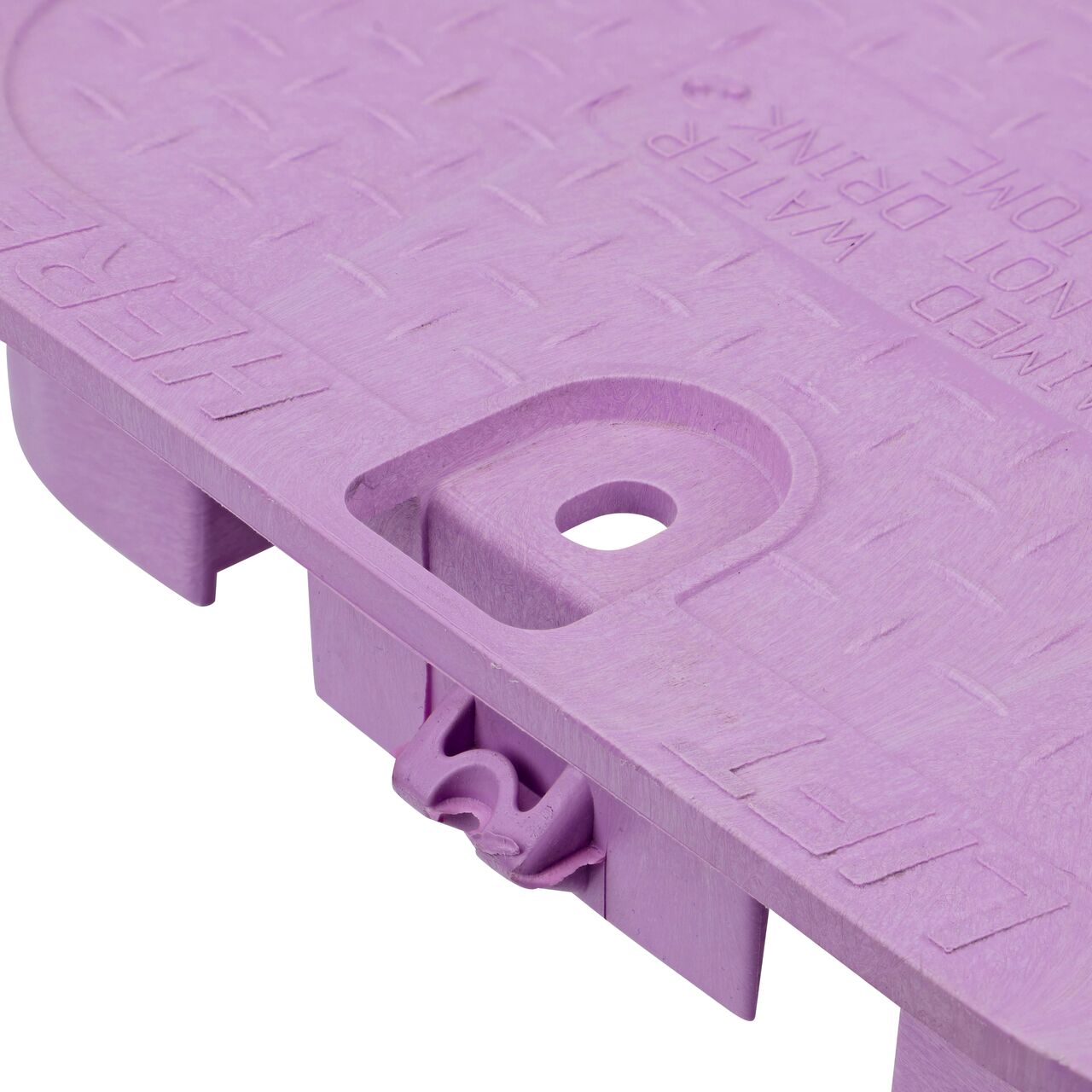 The NDS 14 X 19 in. Rectangular Standard Series Purple Reclaimed Water Valve Box Cover (NDS 113CR) is an overlapping lid shown here from the side, that prevents dirt and debris from entering the valve box