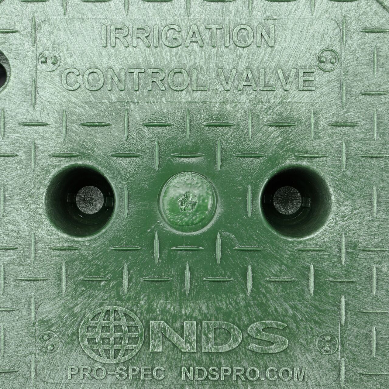 Closeup view of the irrigation control valve markings on the green irrigation control valve cover for the NDS 10 in. Round Pro-Spec® Series Valve Box (NDS 311BCB)